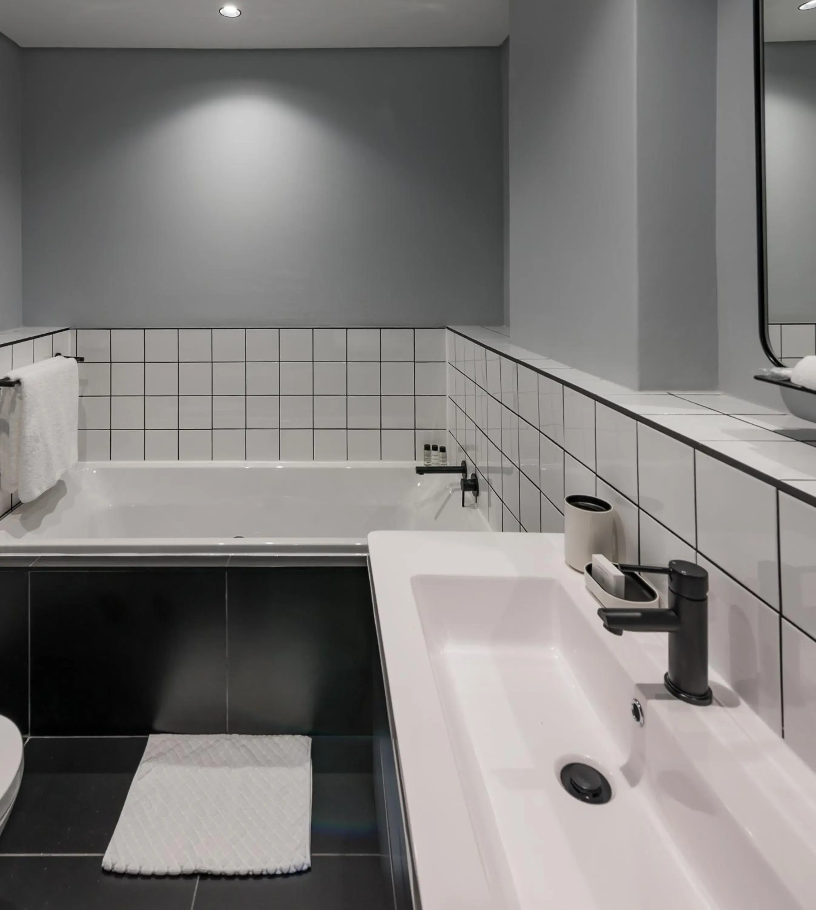 Bathroom in The Onyx Apartment Hotel by NEWMARK Bathroom in The Onyx Apartment Hotel by NEWMARK