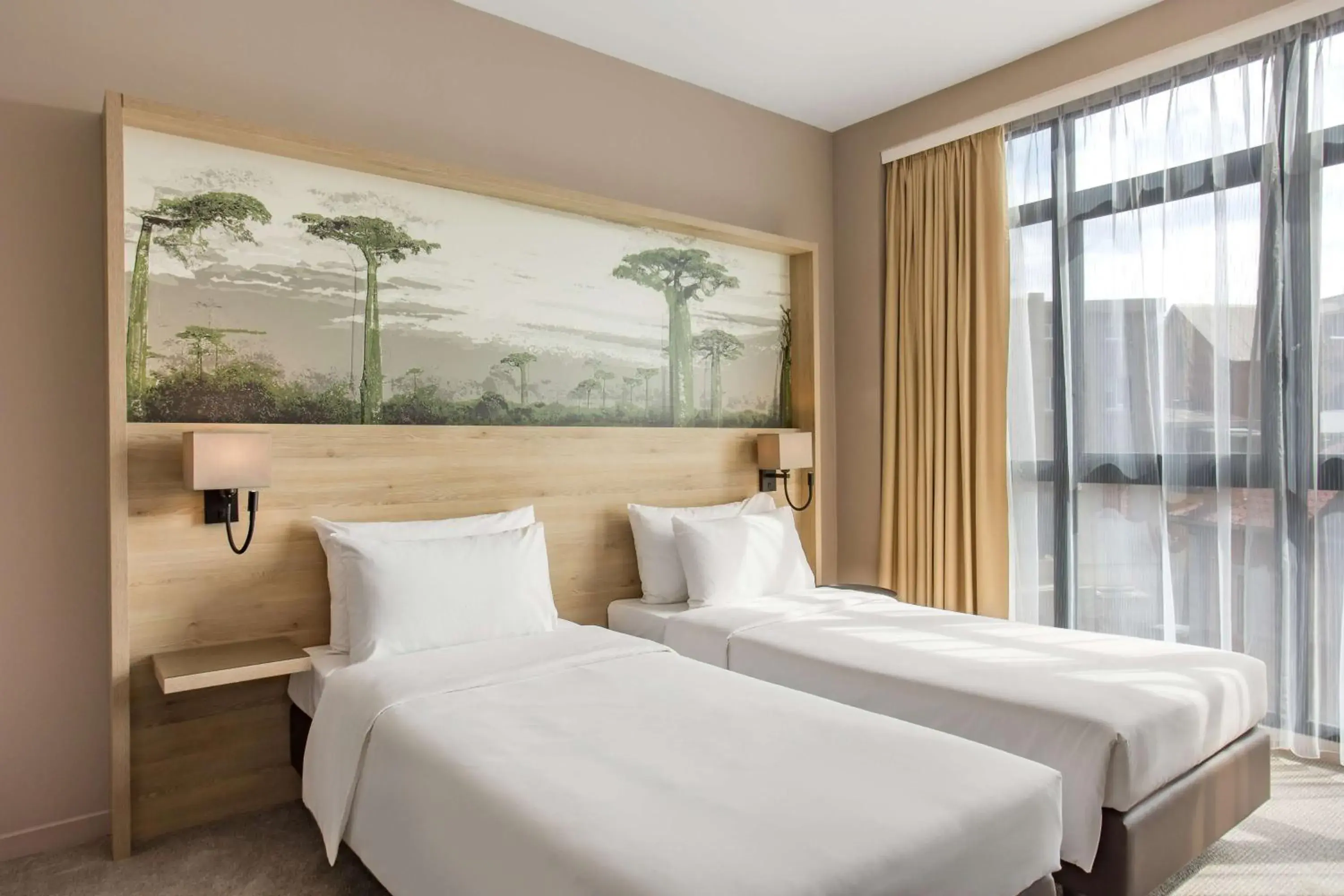 Photo of the whole room, Bed in Radisson Serviced Apartments Antananarivo City Centre Photo of the whole room, Bed in Radisson Serviced Apartments Antananarivo City Centre