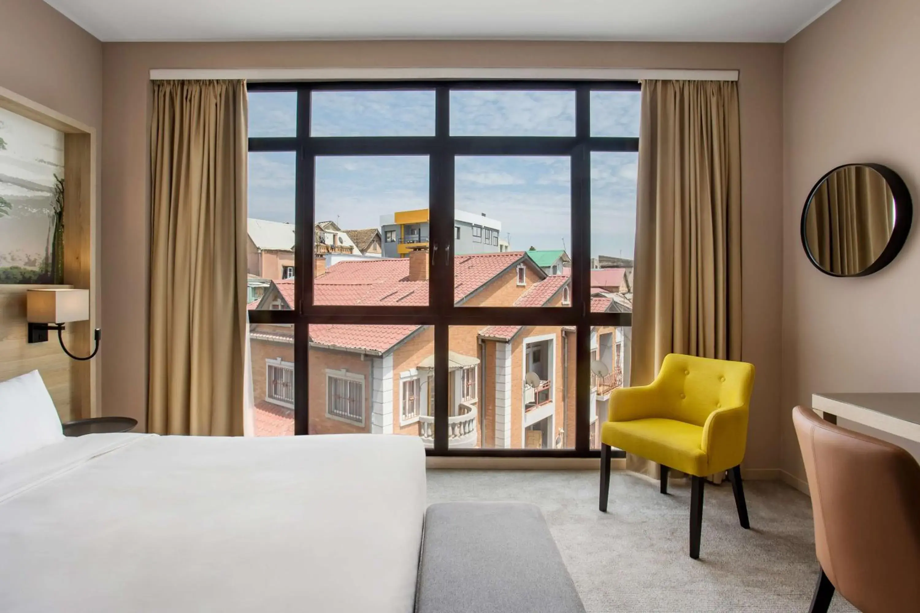 Photo of the whole room, Bed in Radisson Serviced Apartments Antananarivo City Centre Photo of the whole room, Bed in Radisson Serviced Apartments Antananarivo City Centre