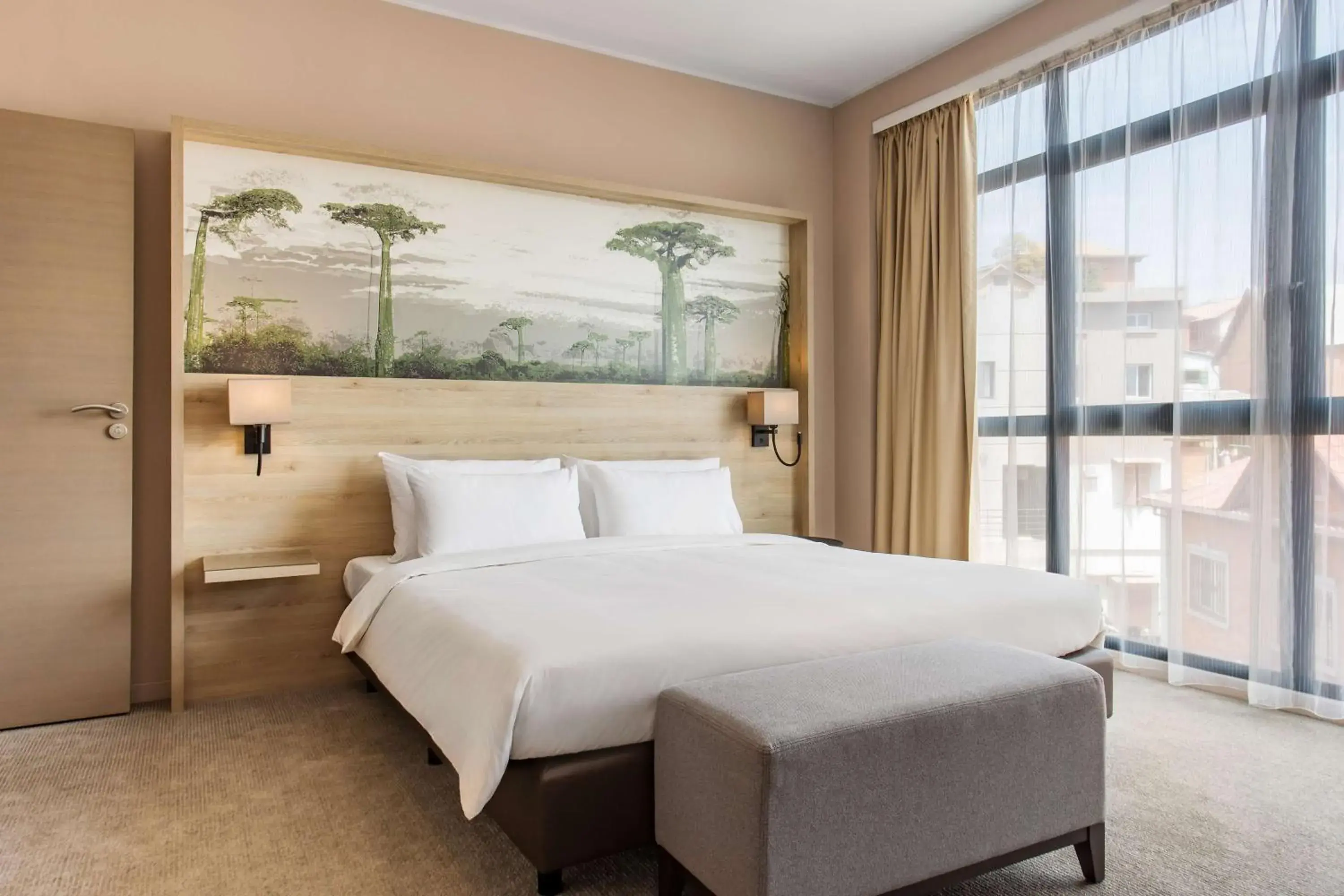 Photo of the whole room, Bed in Radisson Serviced Apartments Antananarivo City Centre Photo of the whole room, Bed in Radisson Serviced Apartments Antananarivo City Centre