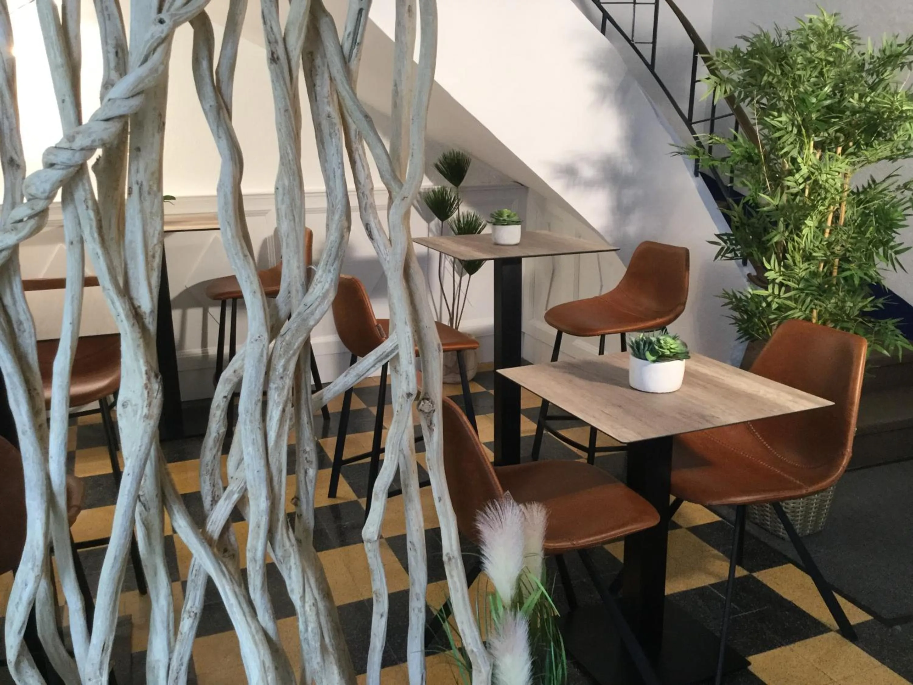 Communal lounge/ TV room in Hôtel Le Mirage