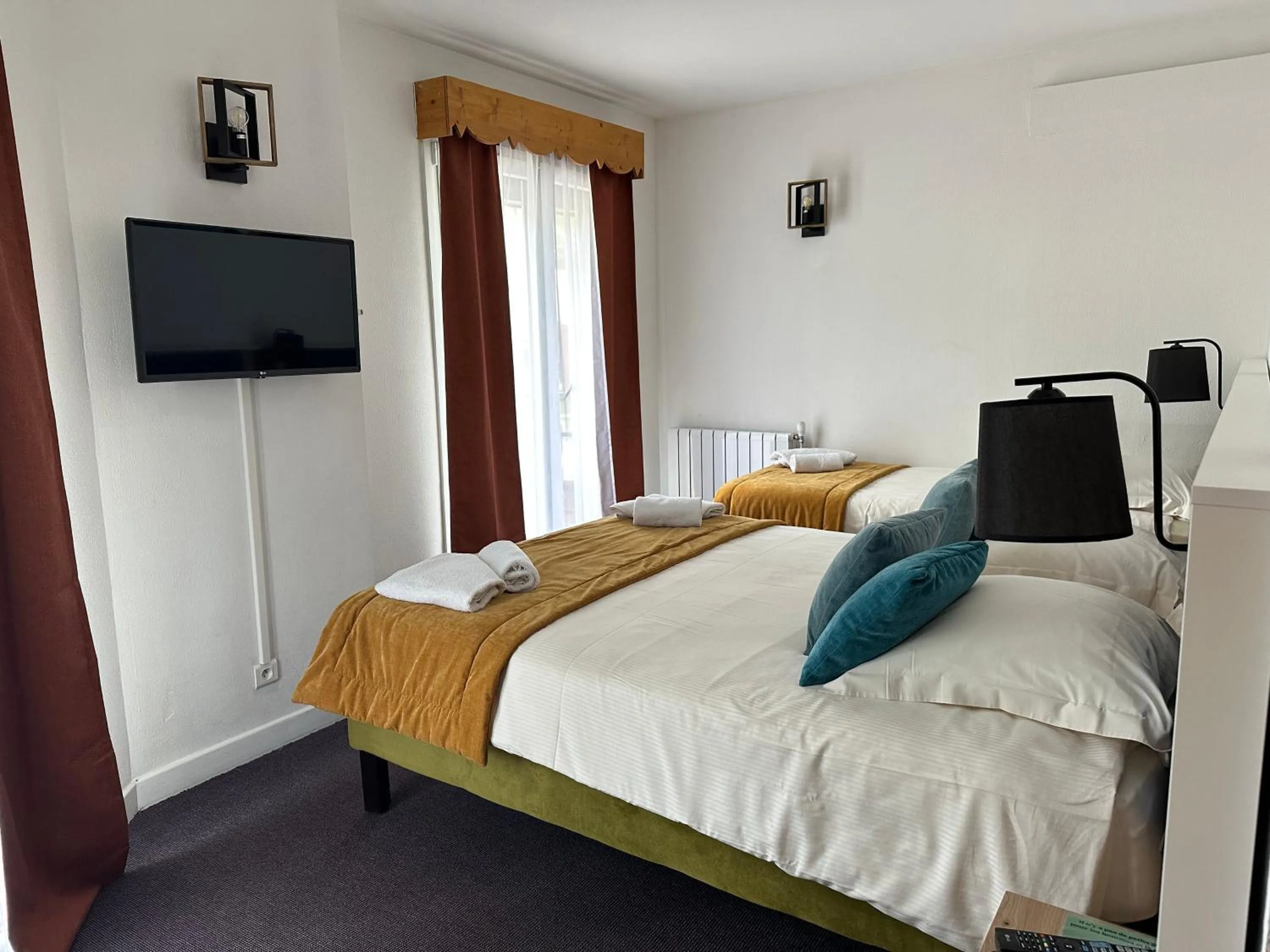 Bed in Hôtel Le Blainon