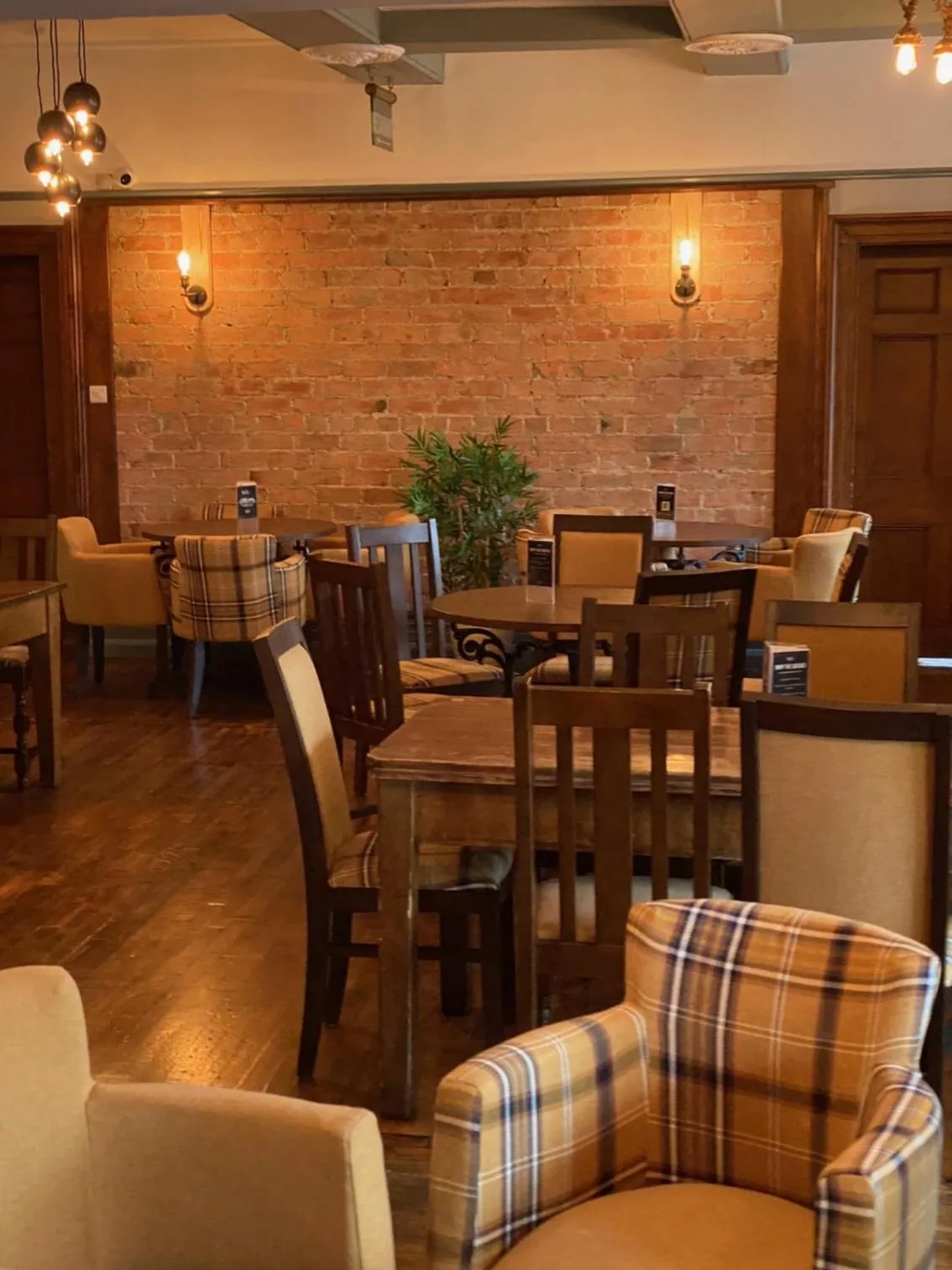 Lounge or bar in The Hand Hotel Llangollen by Compass Hospitality