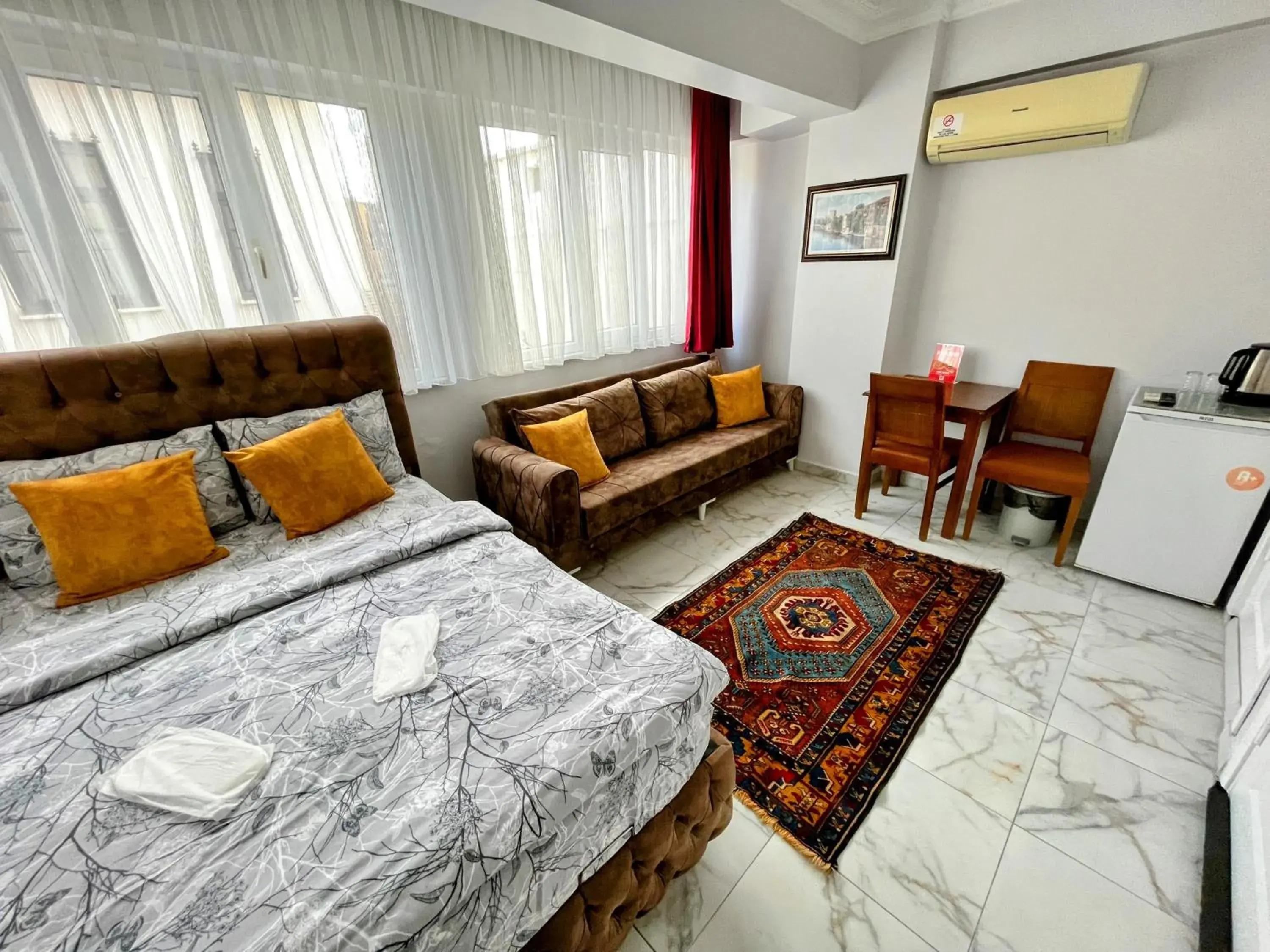 Standard Triple Room in Pembe Hotel Standard Triple Room in Pembe Hotel