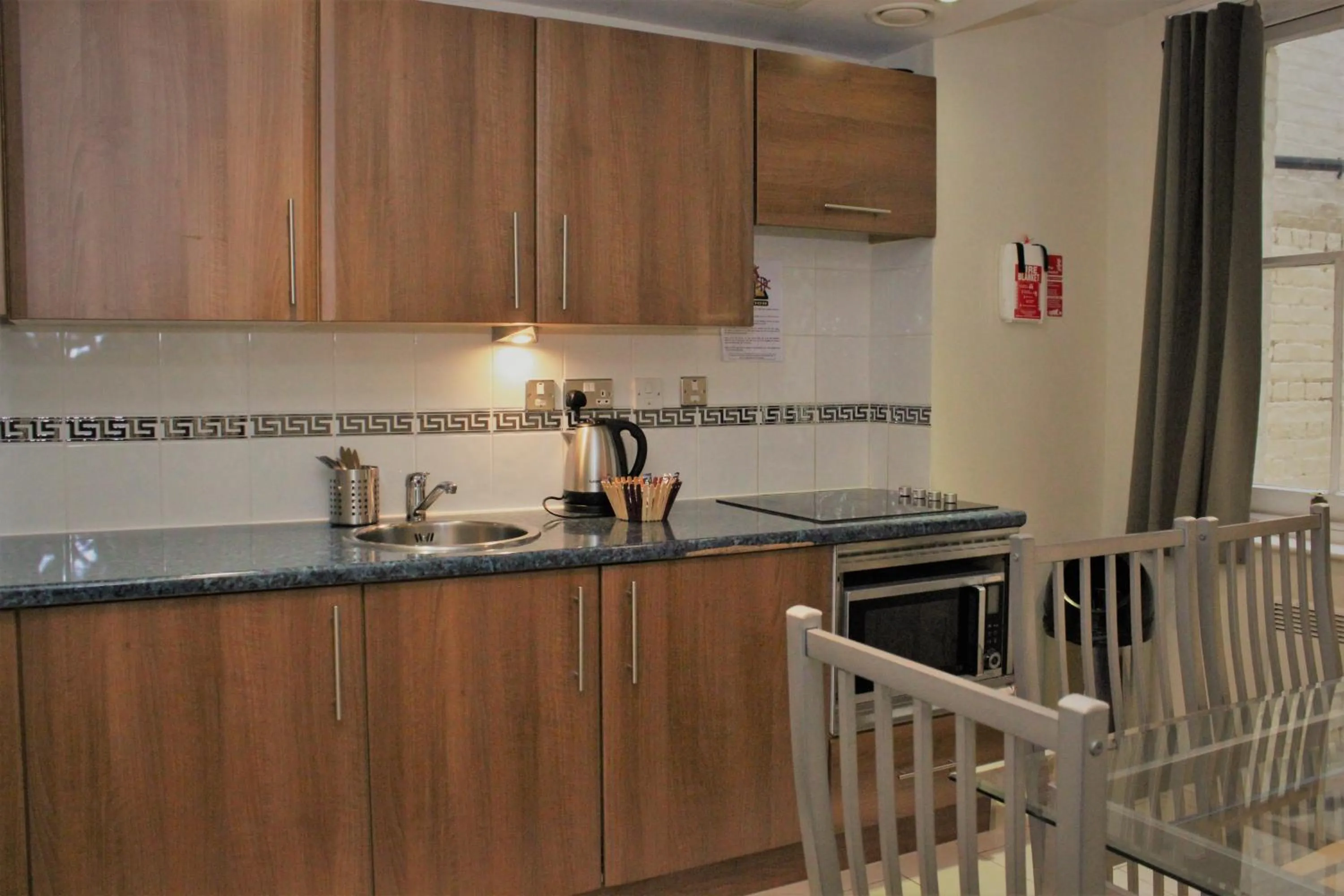Kitchen or kitchenette in Grand Plaza Serviced Apartments
