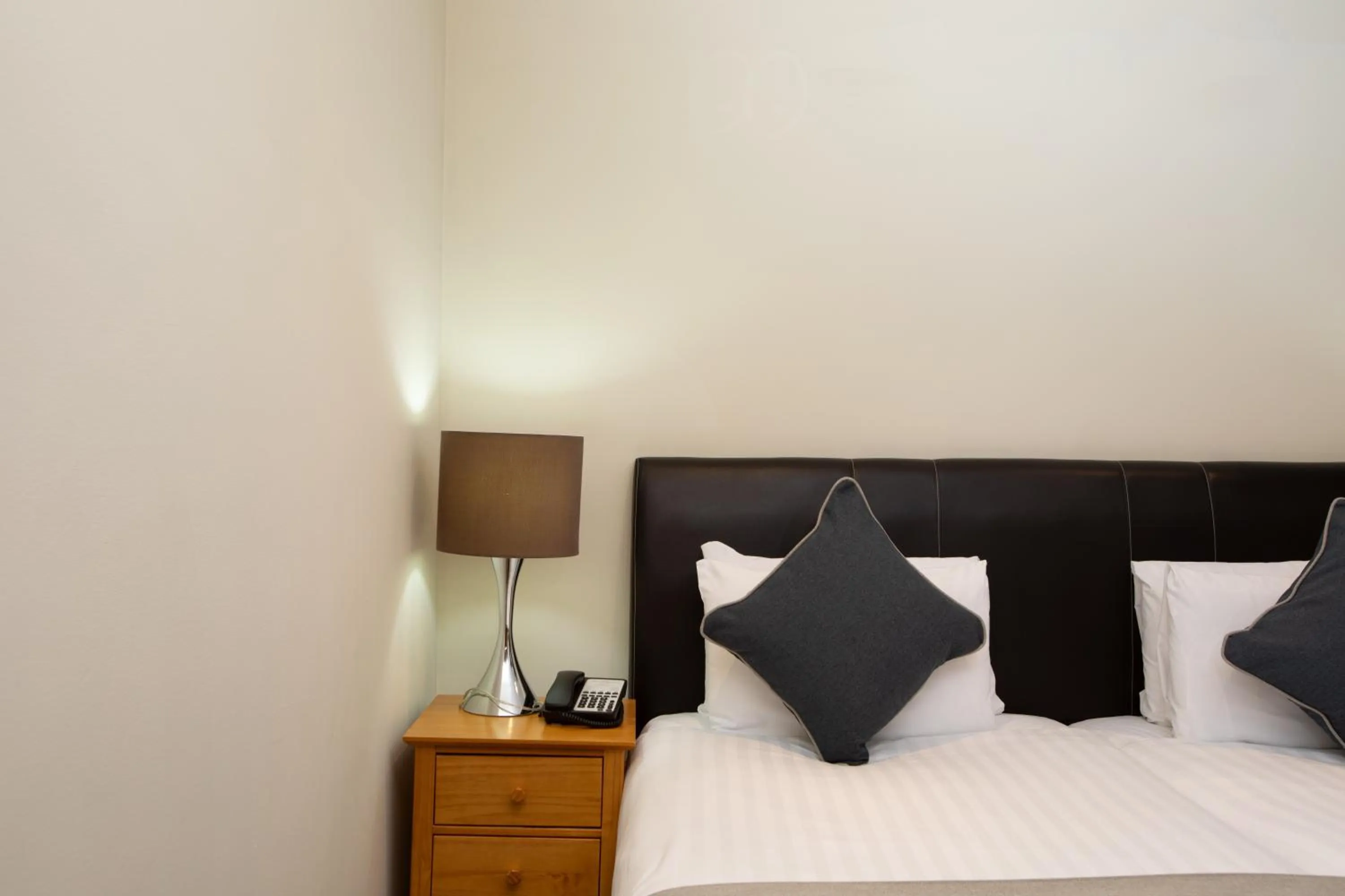 Bed in Grand Plaza Serviced Apartments