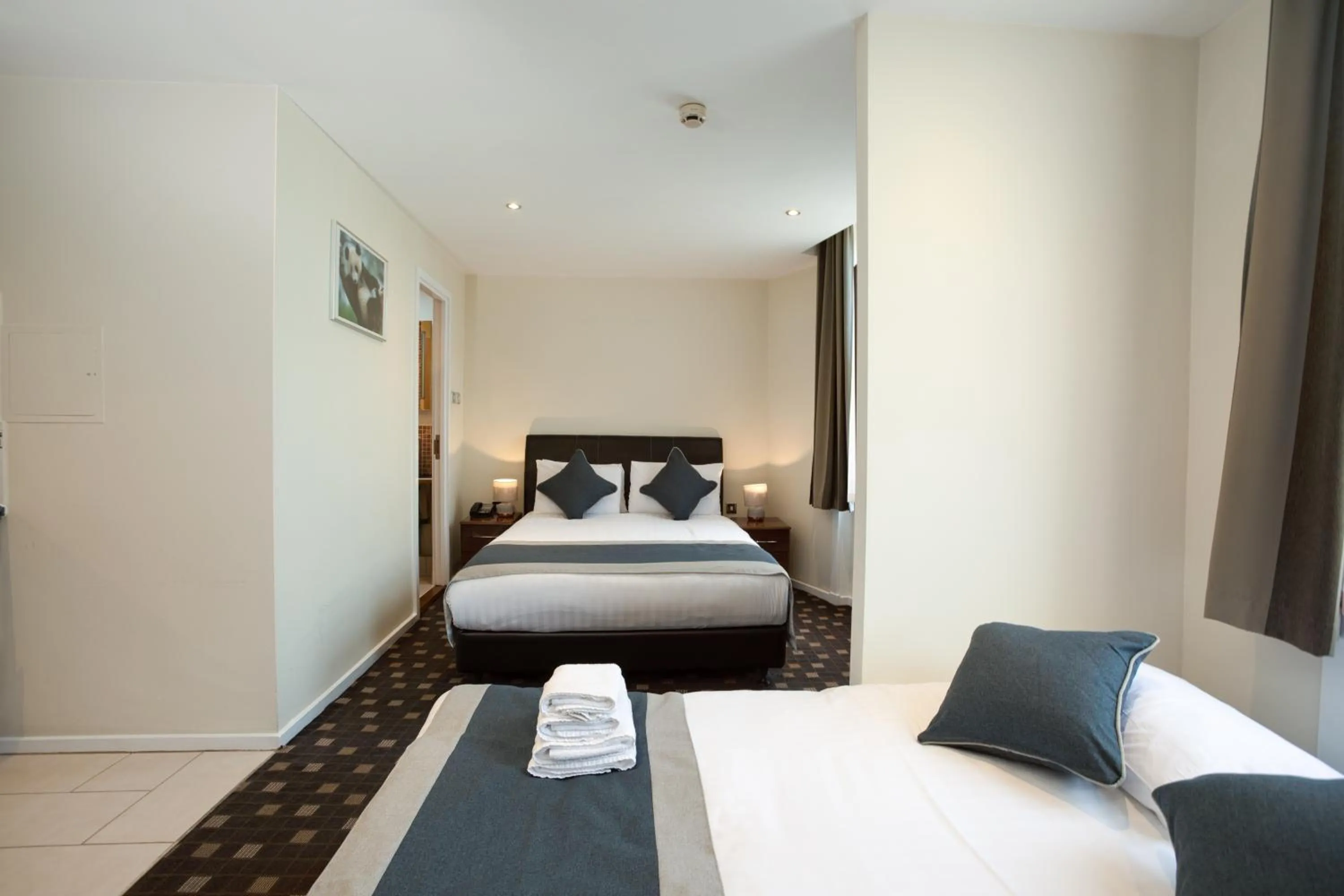 Bed in Grand Plaza Serviced Apartments