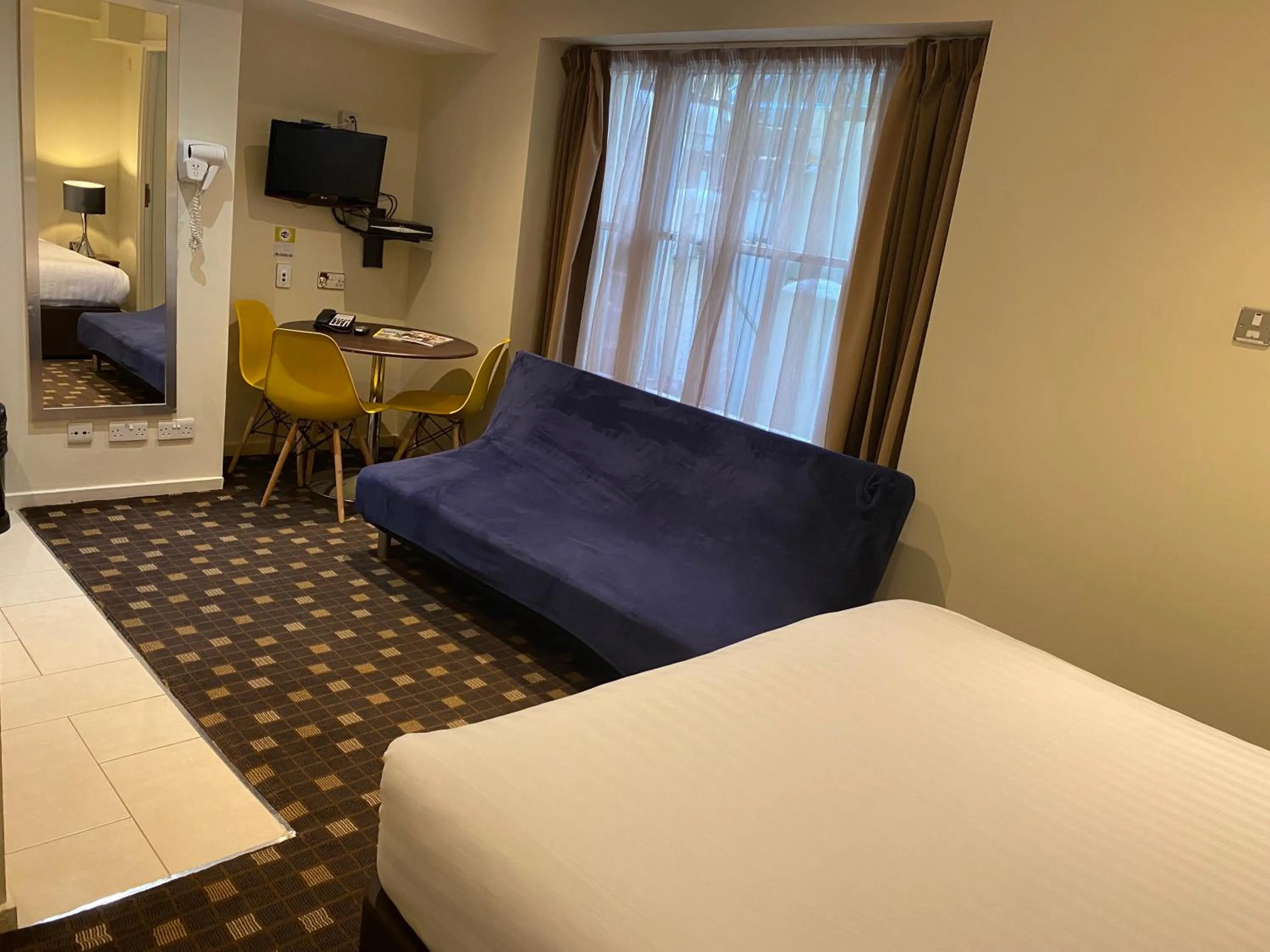 Photo of the whole room, Bed in Grand Plaza Serviced Apartments