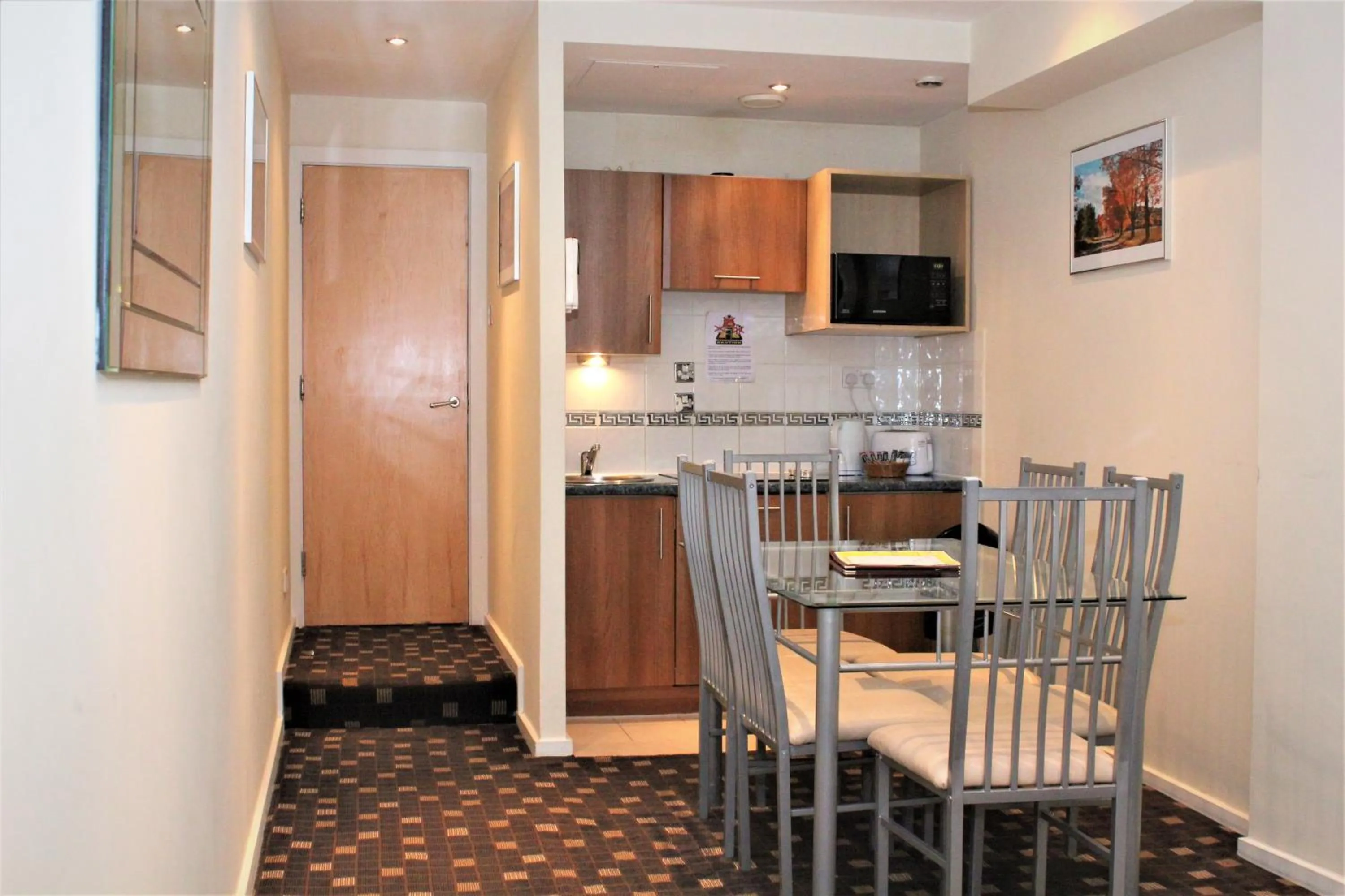 Kitchen or kitchenette in Grand Plaza Serviced Apartments