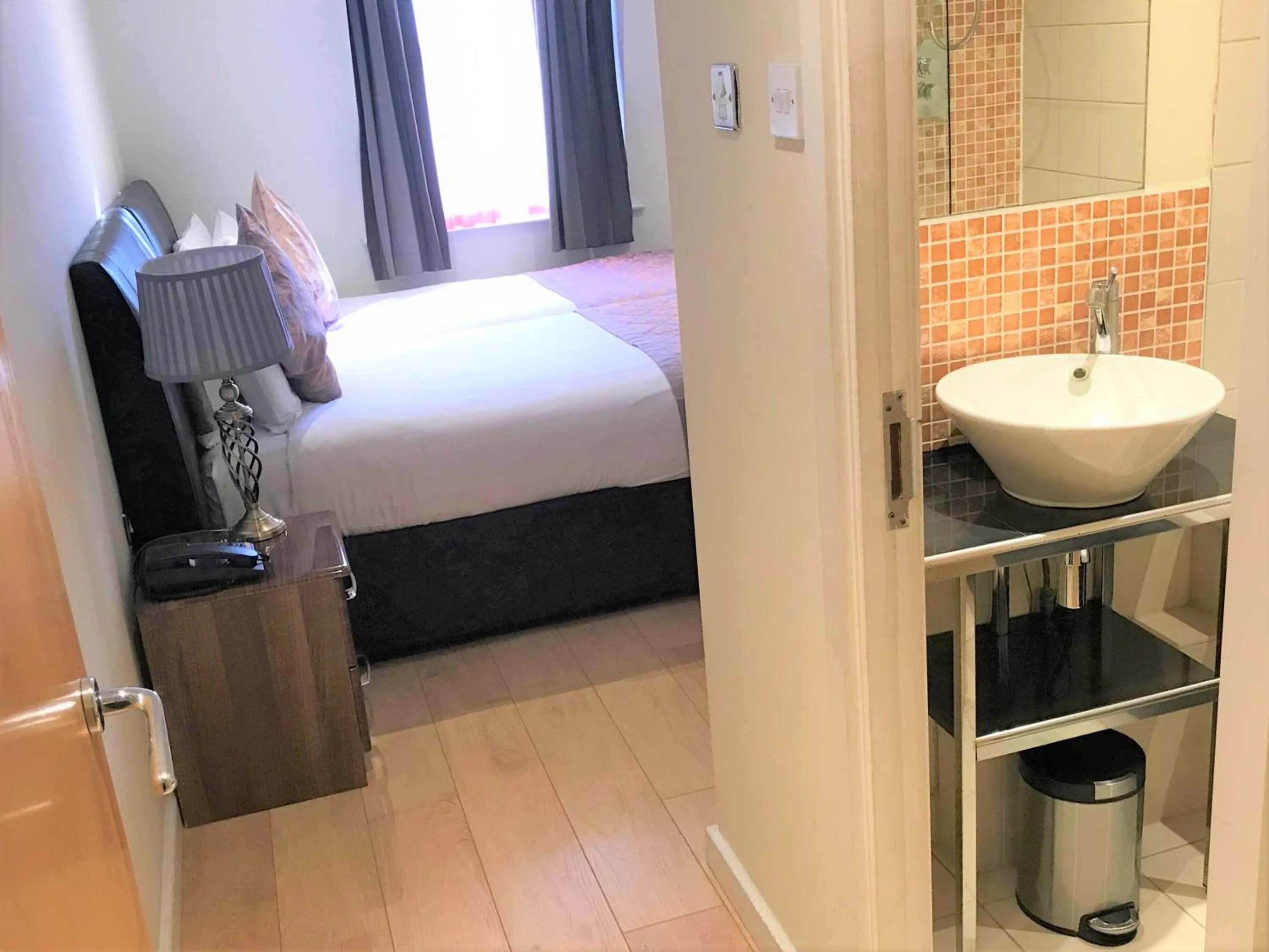 Toilet, Bed in Grand Plaza Serviced Apartments