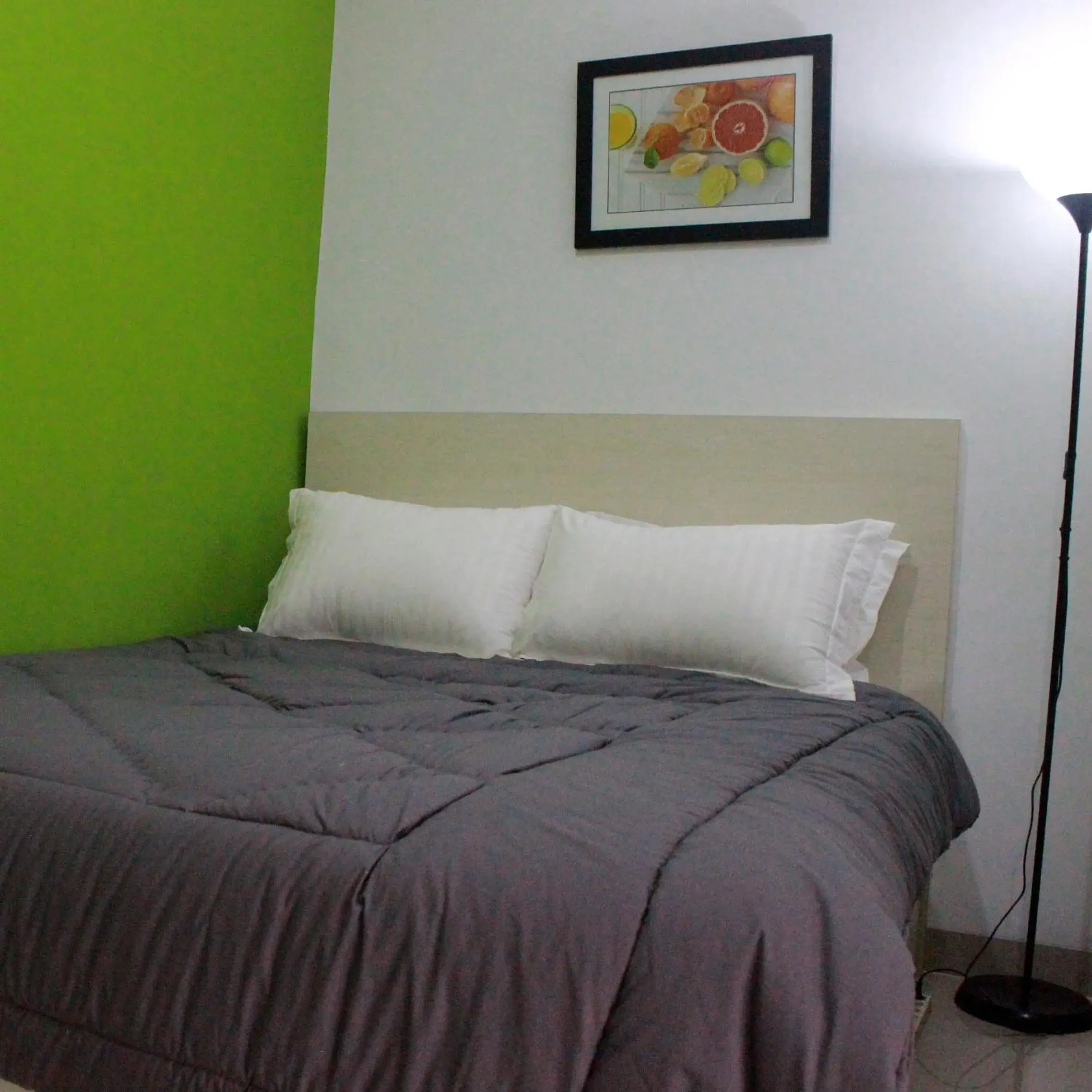 Deluxe Double Room (2 Adults + 1 Child) in Rumah99 Deluxe Double Room (2 Adults + 1 Child) in Rumah99