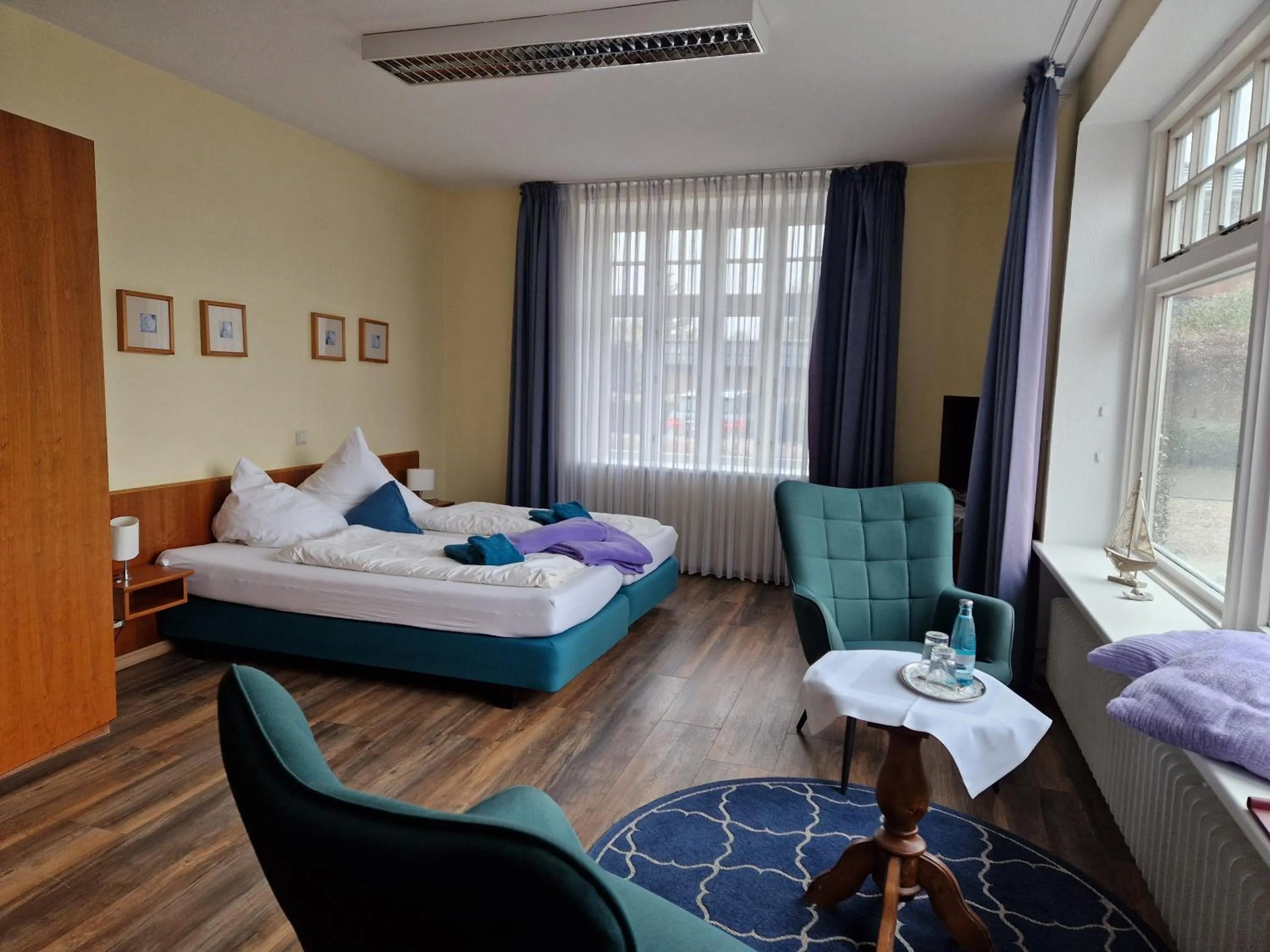 Photo of the whole room, Bed in Hotel Fährhaus Niederkleveez