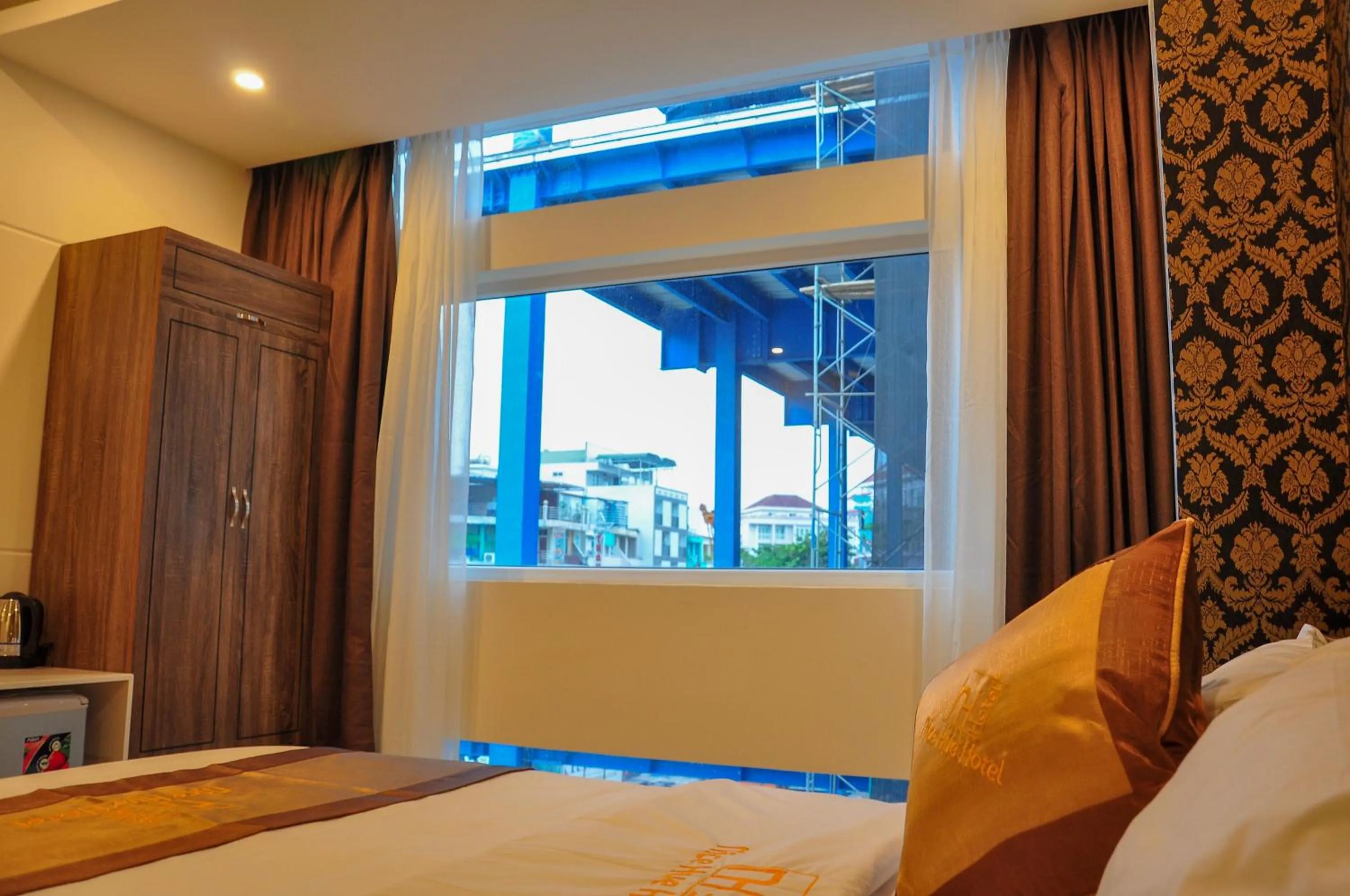 View (from property/room), Bed in Nice Hue Hotel