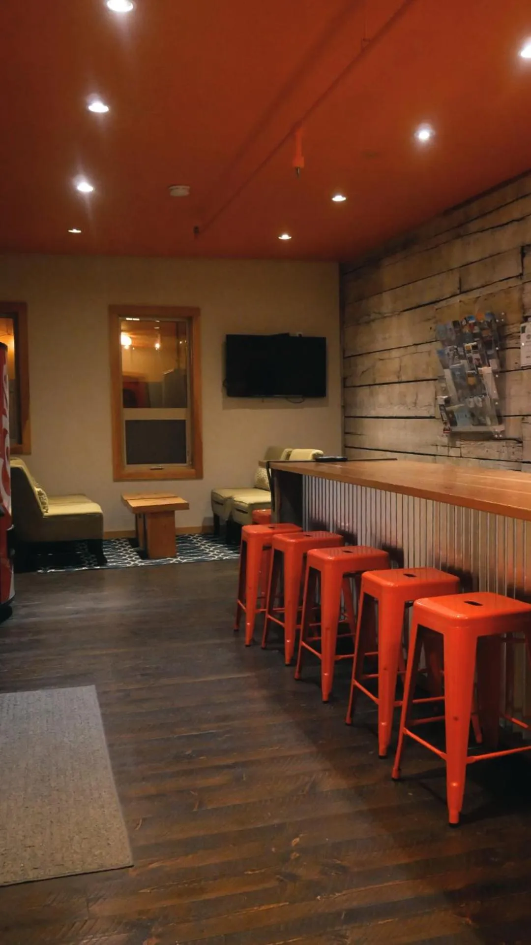 Communal lounge/ TV room in Adventure Hotel