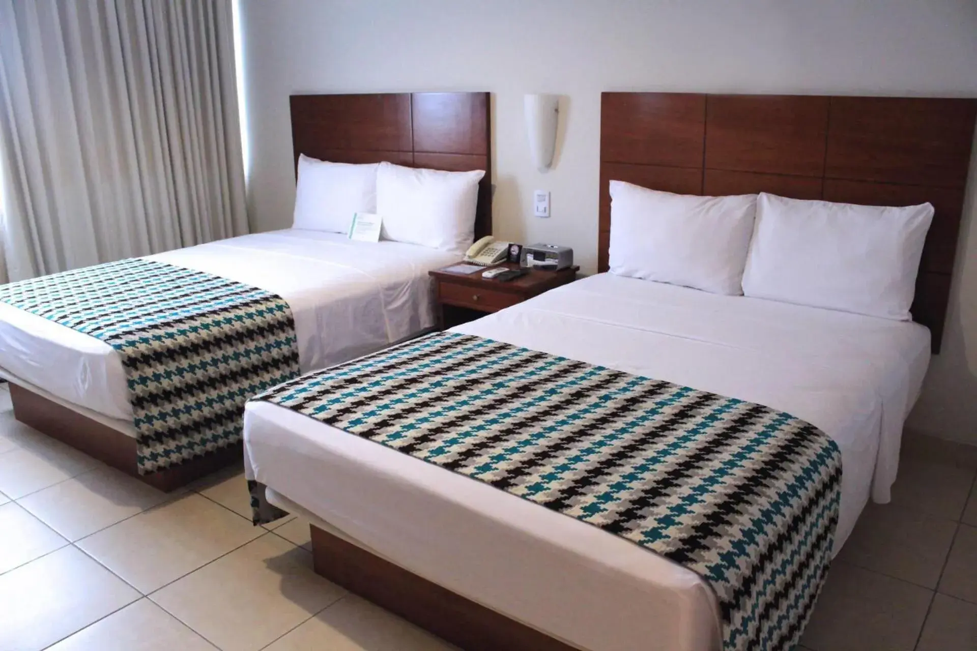 Photo of the whole room, Bed in Wyndham Costa del Sol Pucallpa Photo of the whole room, Bed in Wyndham Costa del Sol Pucallpa