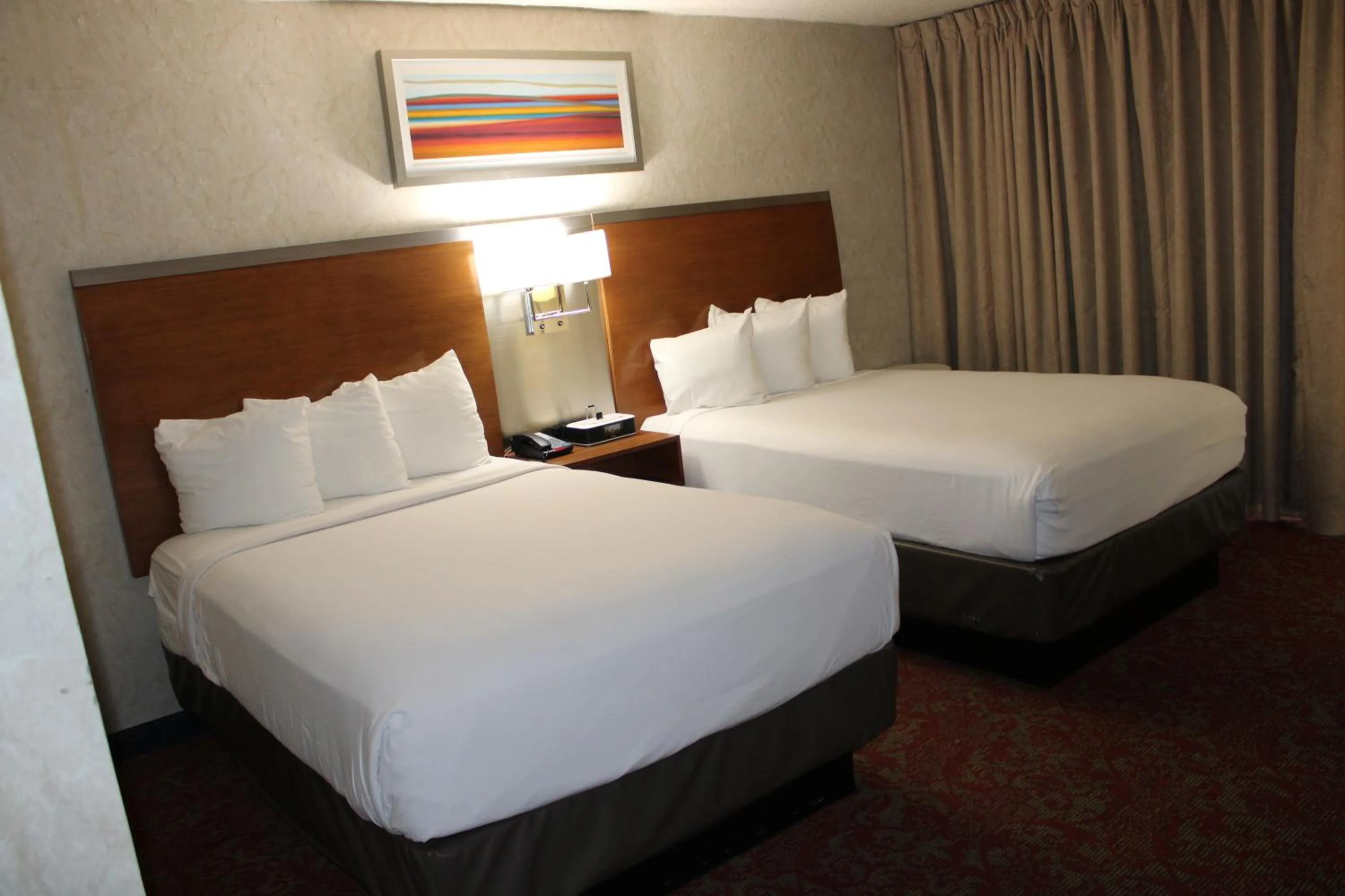 Bed in Clarion Hotel Bakersfield North
