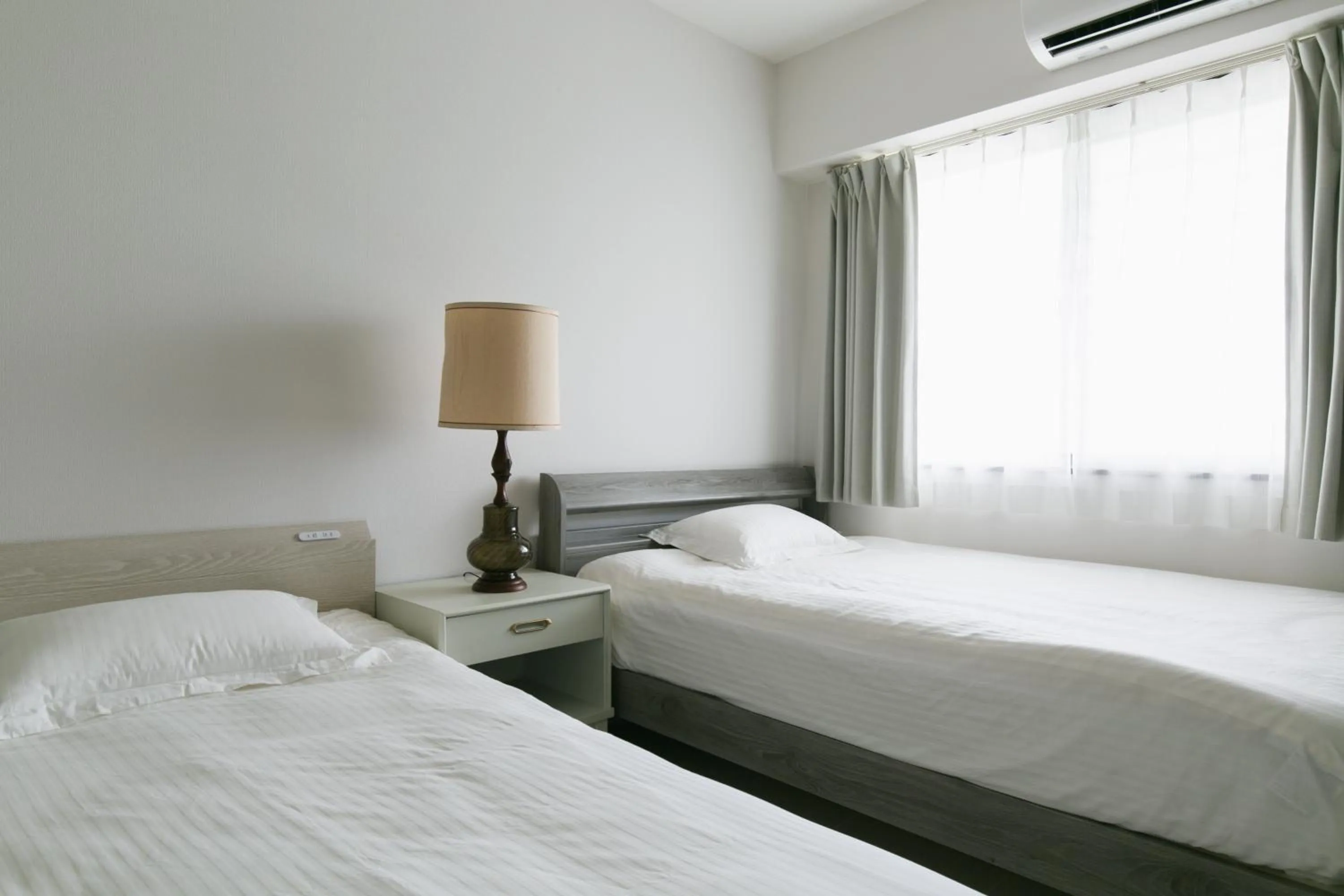 Bedroom, Bed in Hideout Okinawa Uruma