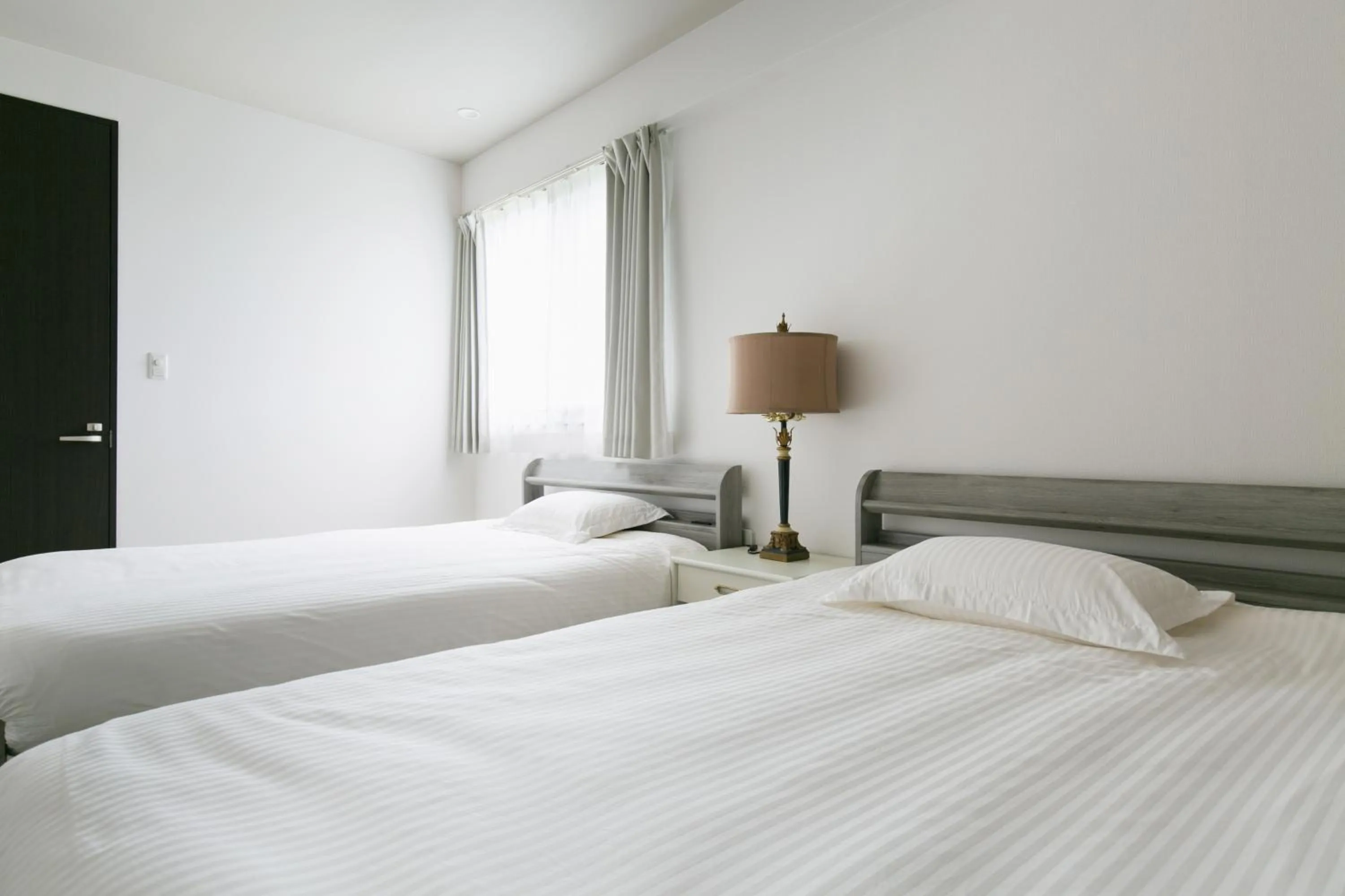 Bedroom, Bed in Hideout Okinawa Uruma