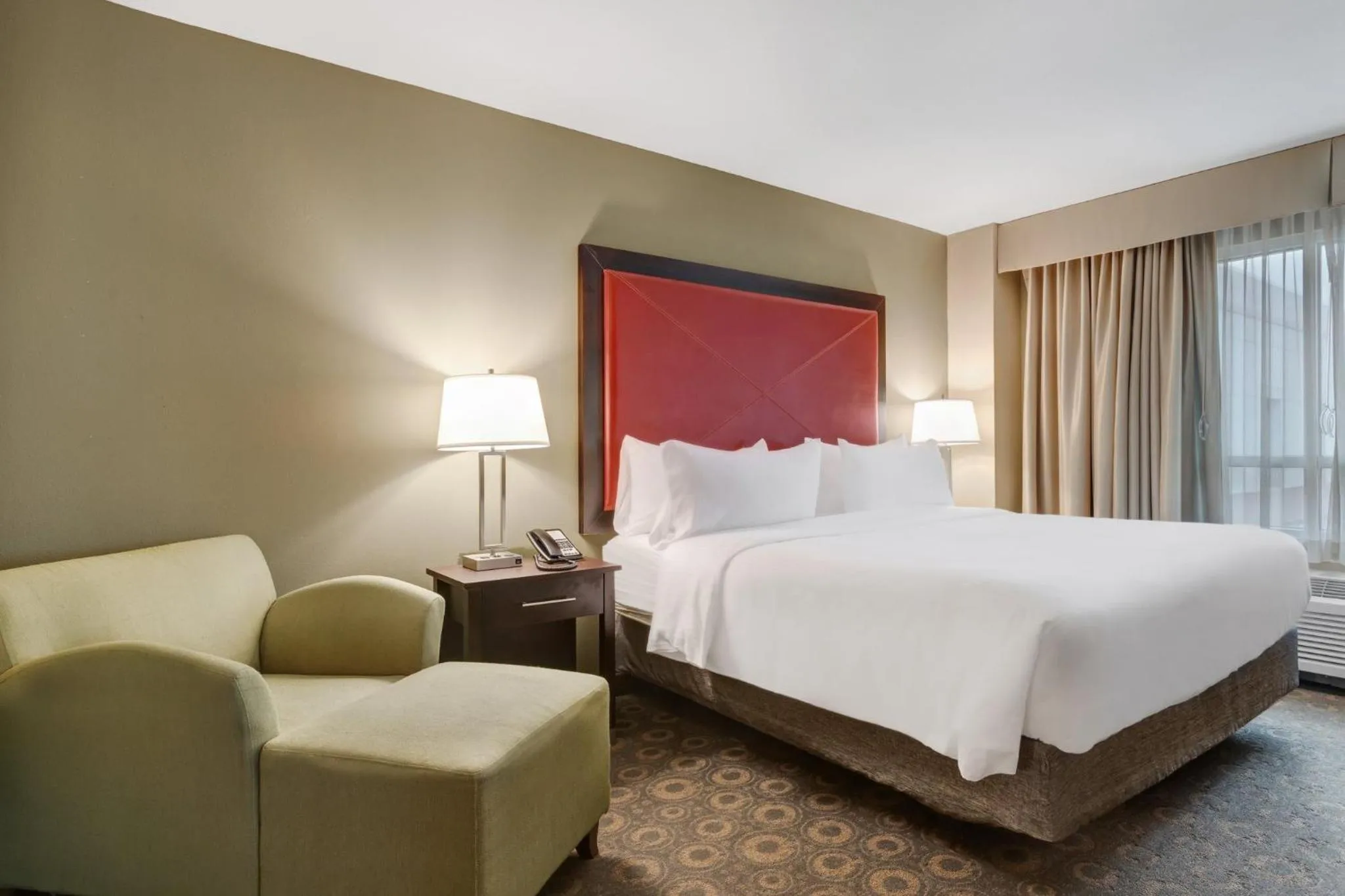 Photo of the whole room, Bed in Crowne Plaza Houston Galleria Area by IHG