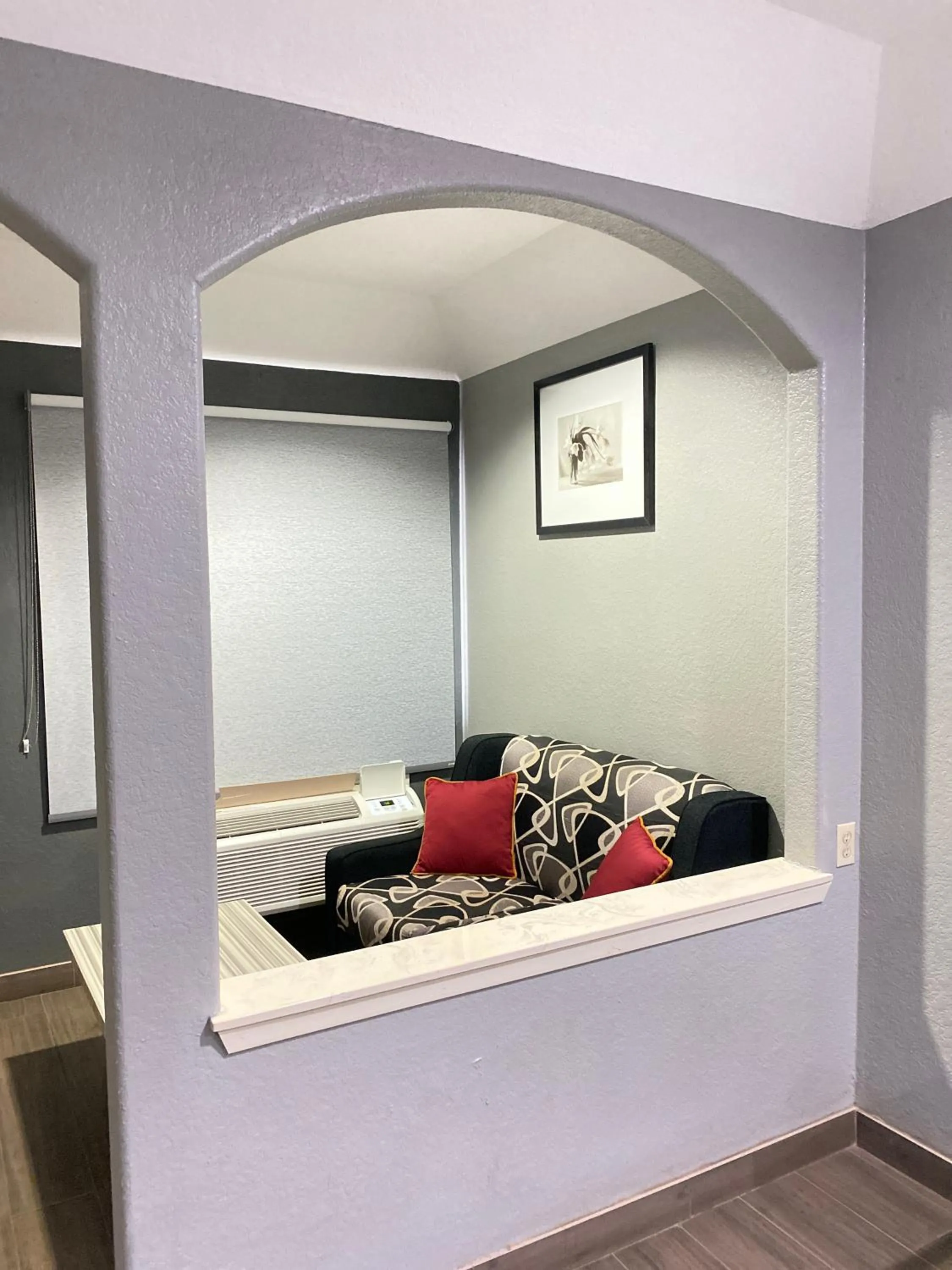 Seating area in Island Suites Hobby Airport