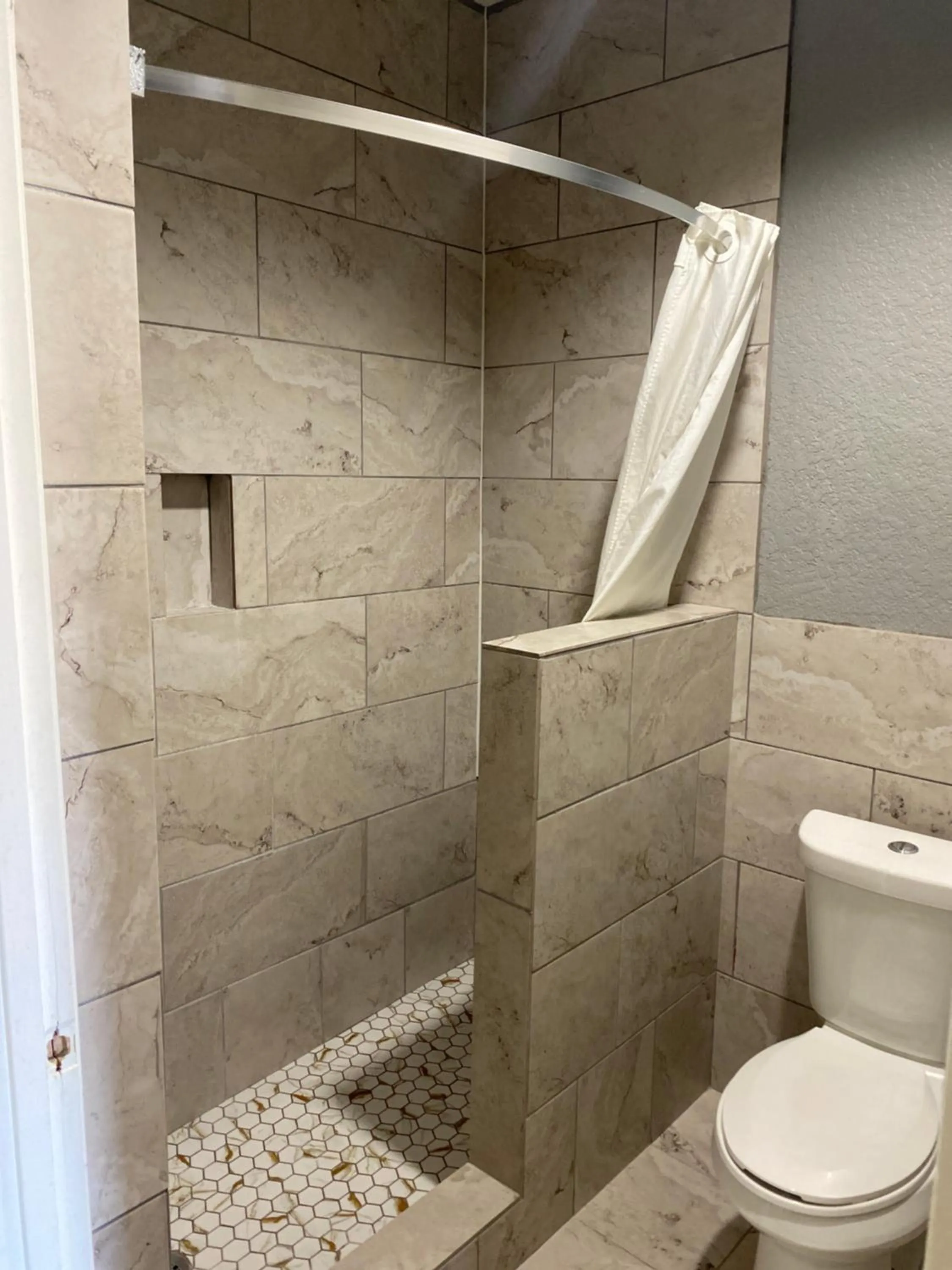 Shower in Island Suites Hobby Airport