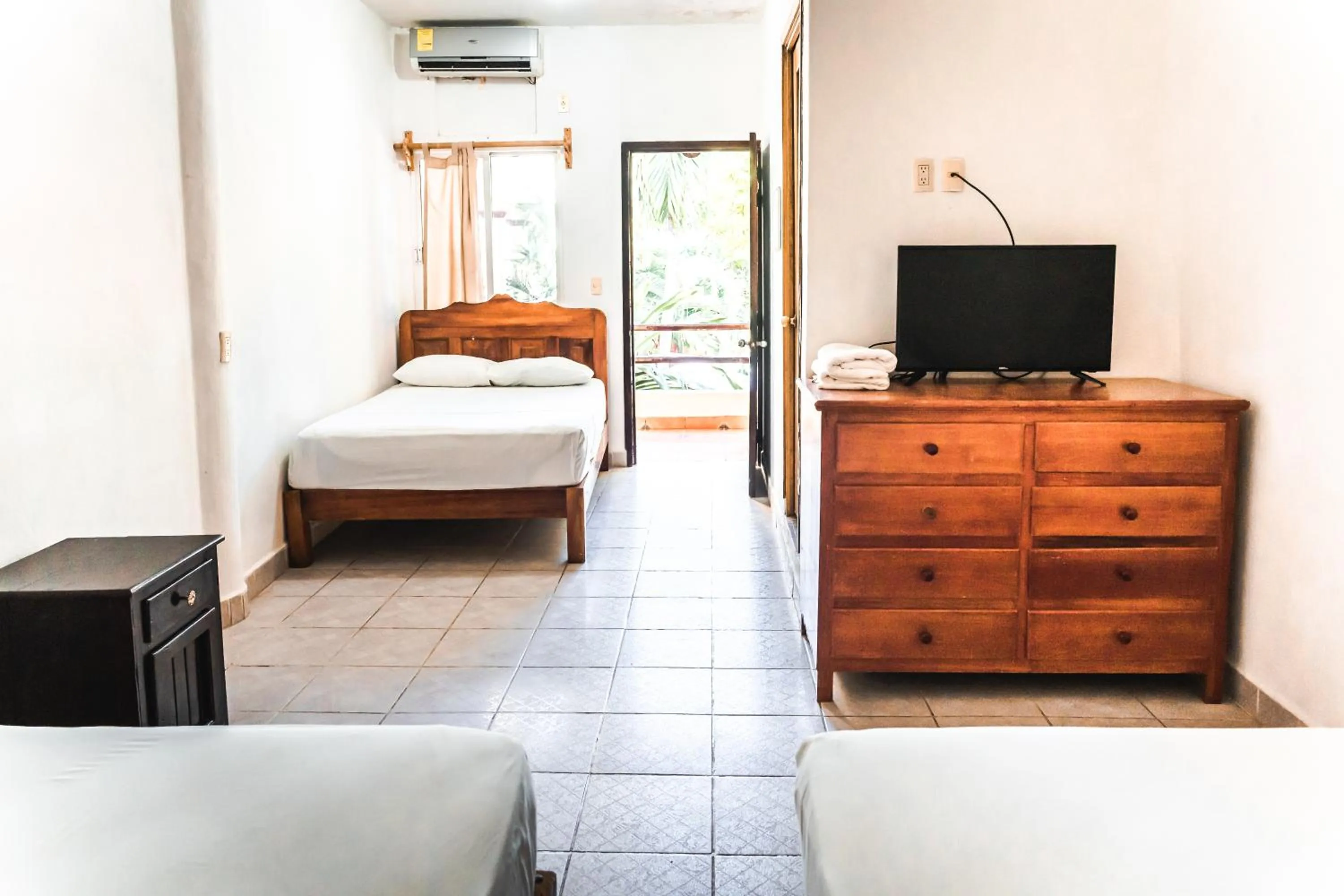 Bedroom in Hotel Bungalows Acuario