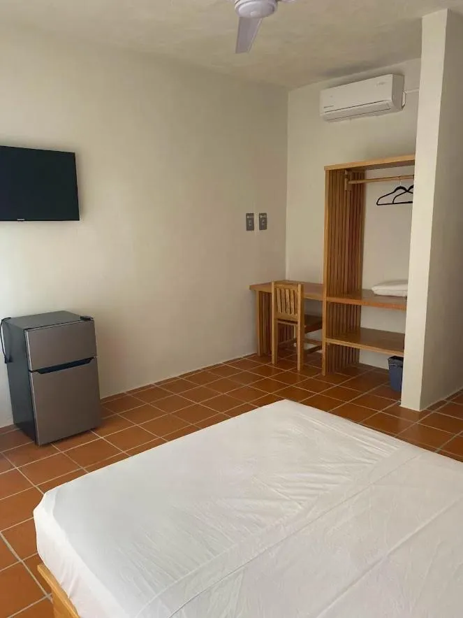 Bed in Hotel Bungalows Acuario