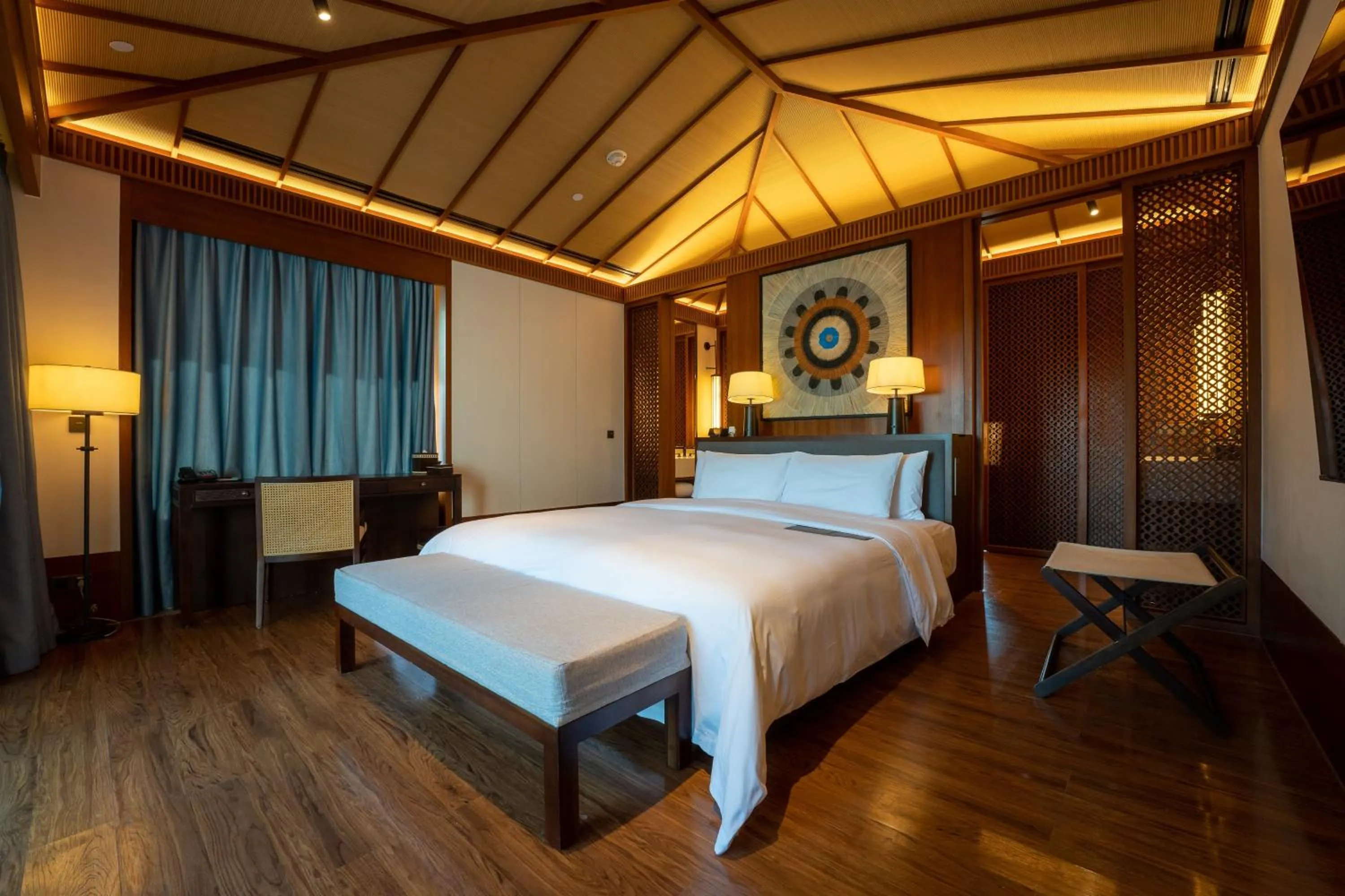 Photo of the whole room, Bed in Le Méridien Shimei Bay Beach Resort & Spa