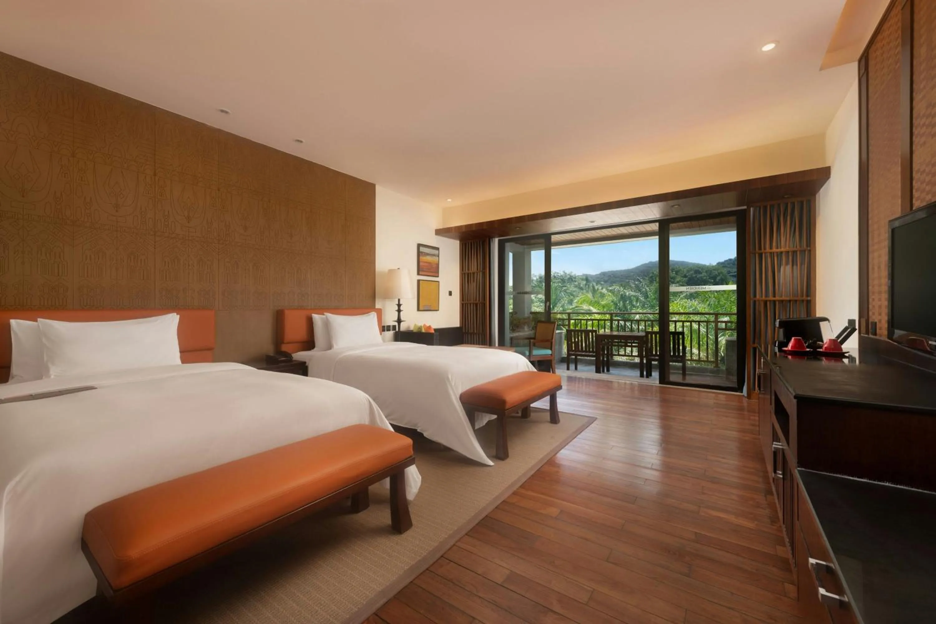 Photo of the whole room, Bed in Le Méridien Shimei Bay Beach Resort & Spa
