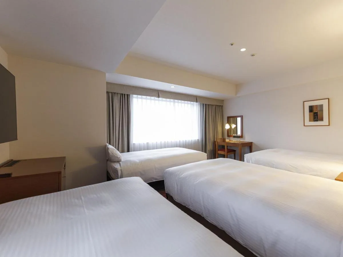 Photo of the whole room, Bed in JR Kyushu Station Hotel Kokura
