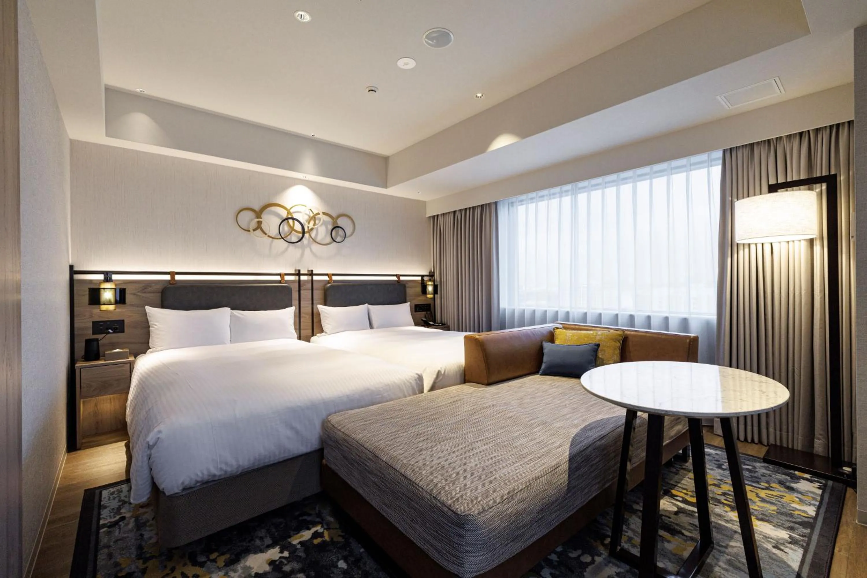 Bed in JR Kyushu Station Hotel Kokura