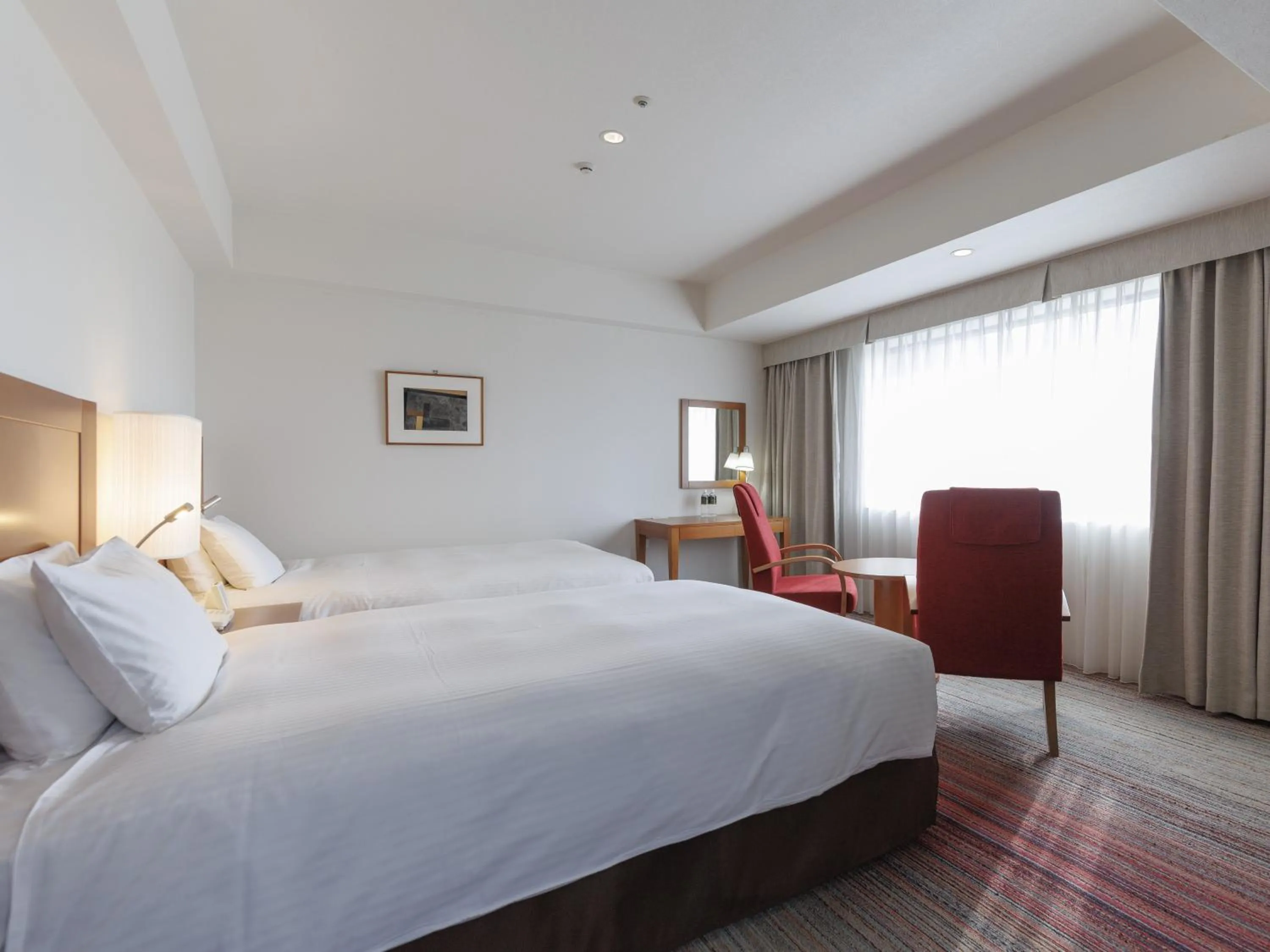 Bed in JR Kyushu Station Hotel Kokura