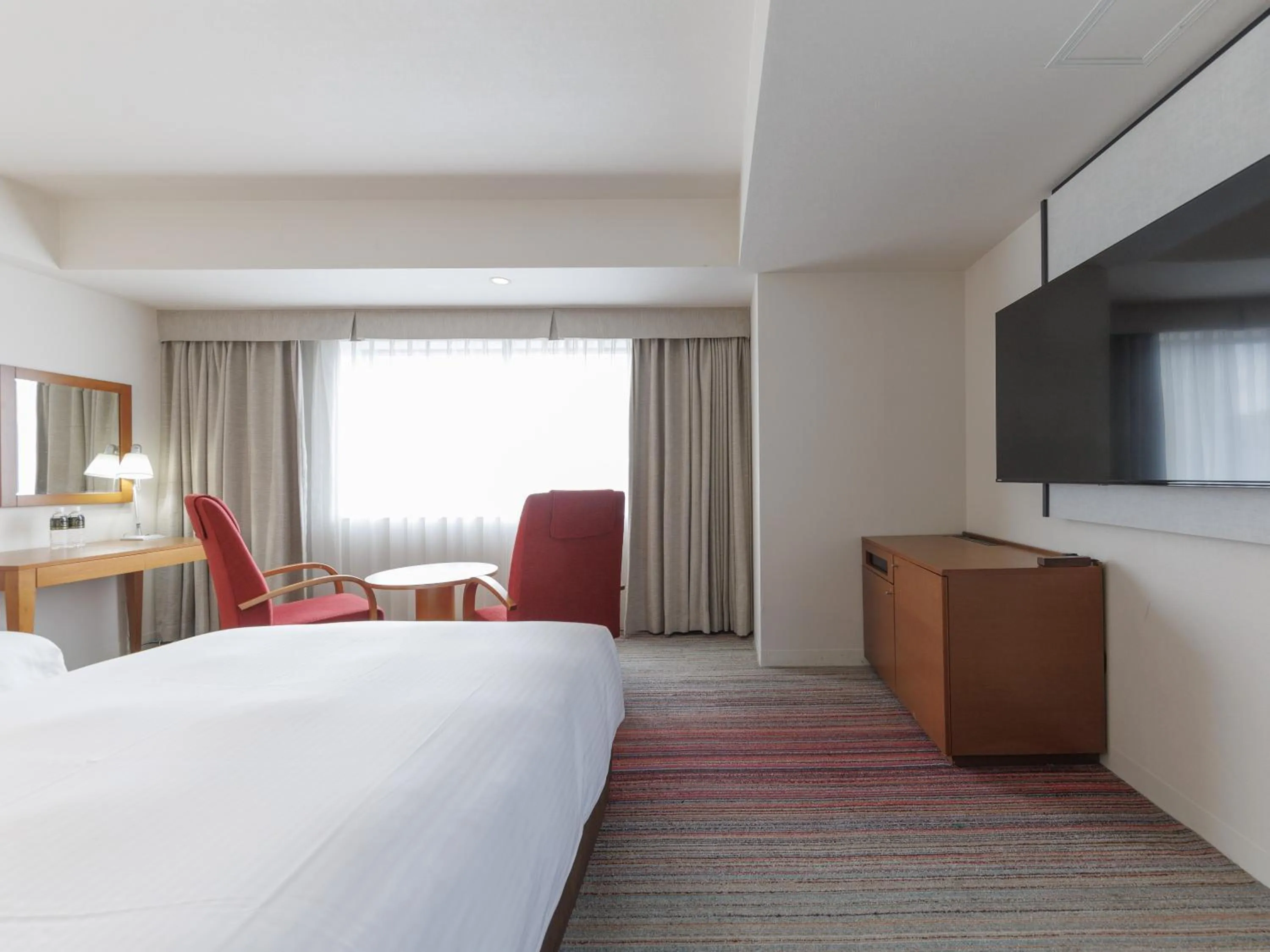 Bed in JR Kyushu Station Hotel Kokura