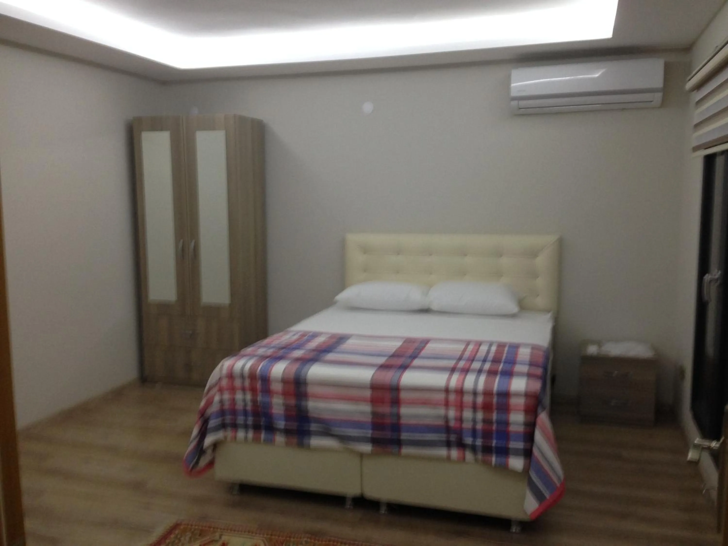 Bed in Seyran Seaside Apartments- 2-garden floor