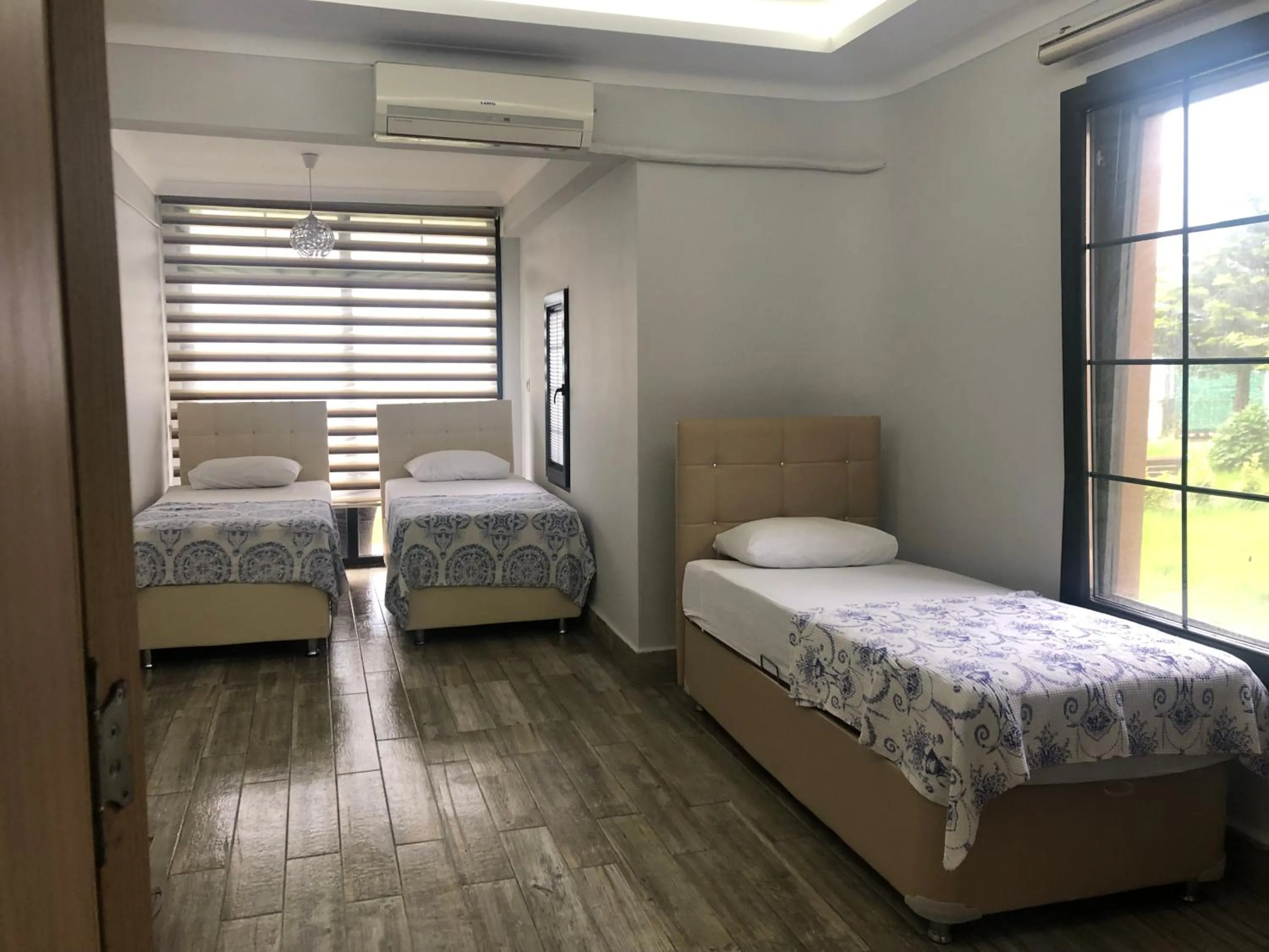 Bed in Seyran Seaside Apartments- 2-garden floor