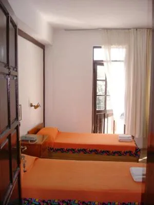 Bed in Villa Rhapsody Pension