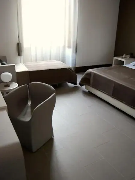 Family Room (2 Adults + 1 Child) in Hotel Palazzo Fortunato Family Room (2 Adults + 1 Child) in Hotel Palazzo Fortunato