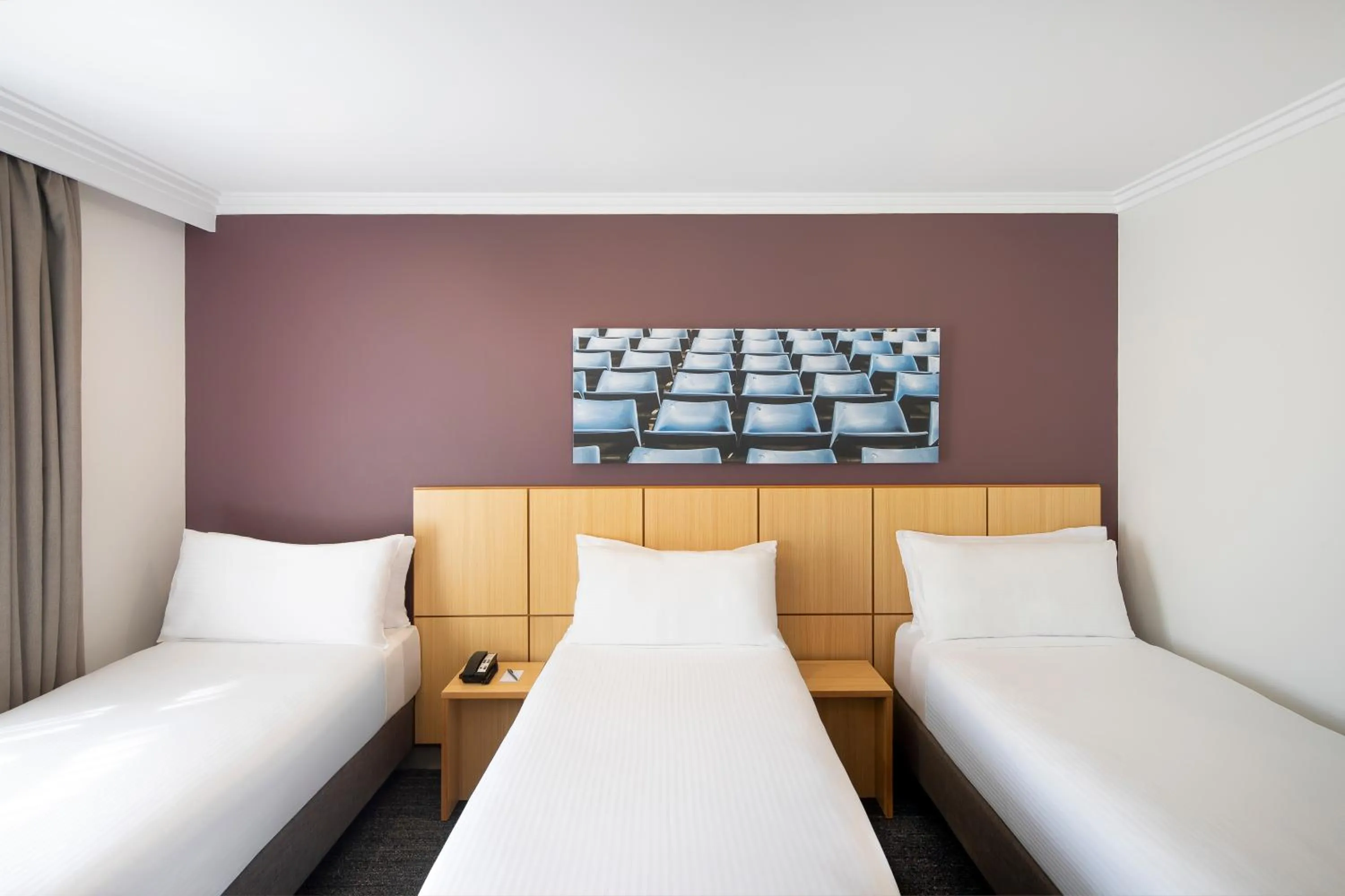 Bed in Mercure Sydney Blacktown