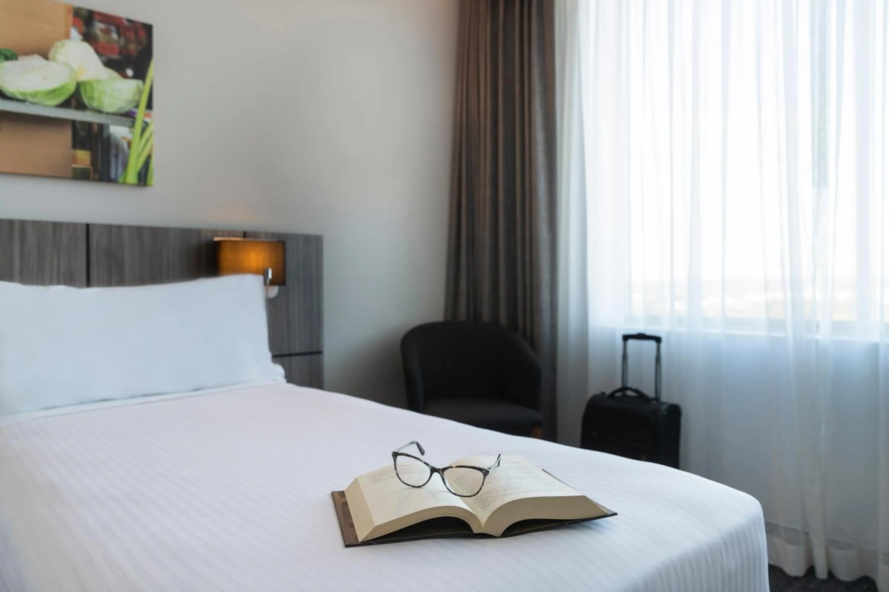 Bed in Mercure Sydney Bankstown