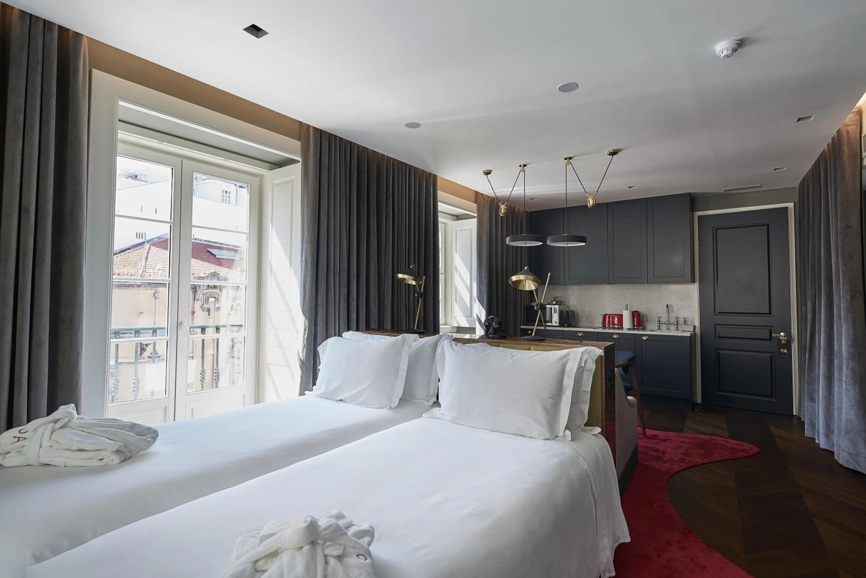 Bed in O Artista Suites by Europe