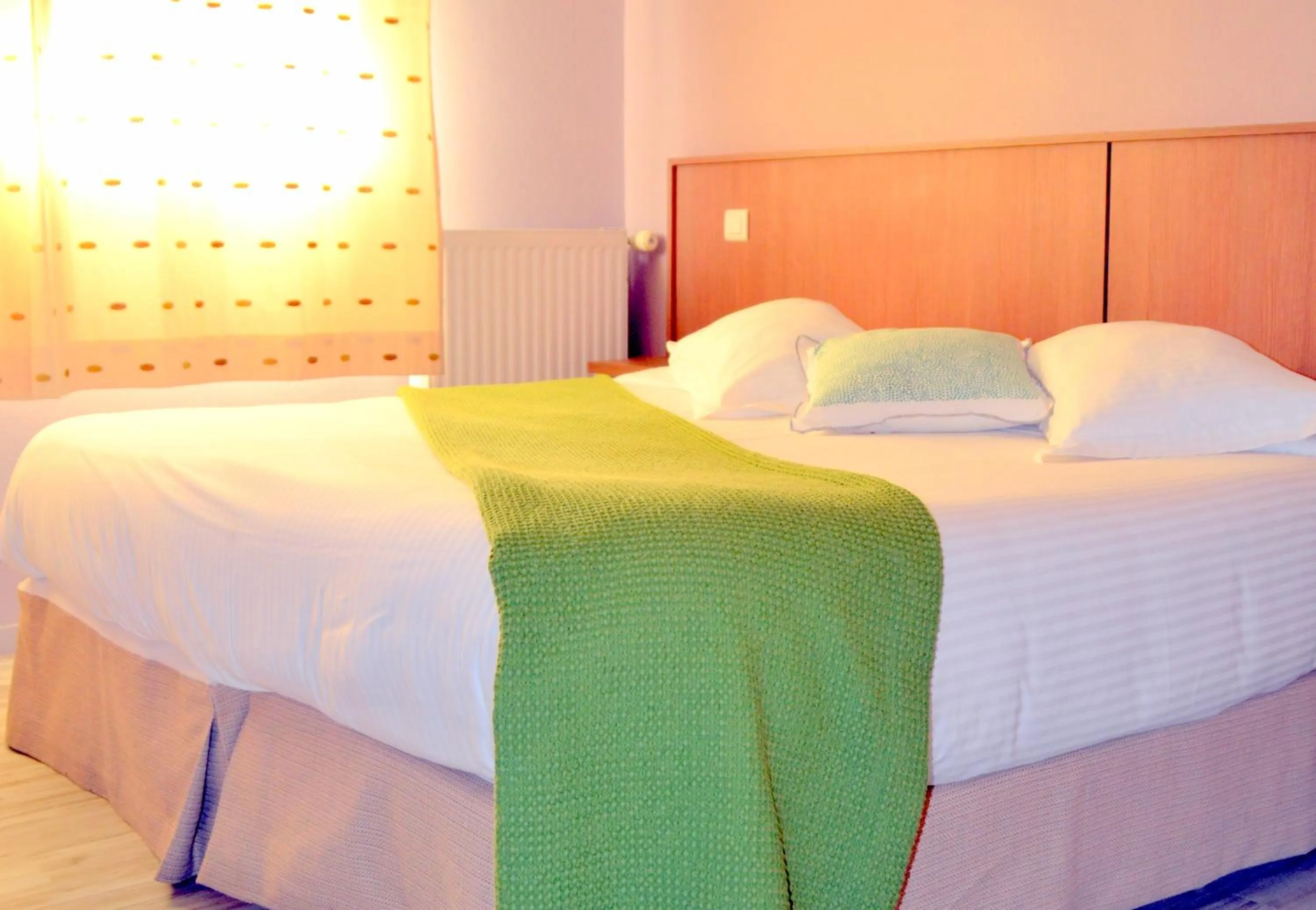 Bed in Le Rhien Hôtel-Restaurant