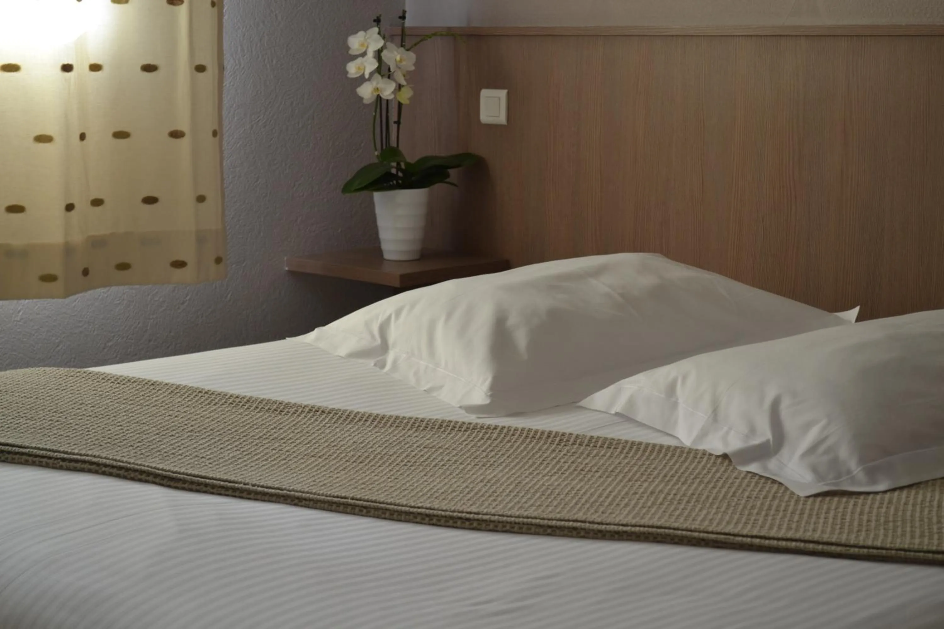 Bed in Le Rhien Hôtel-Restaurant