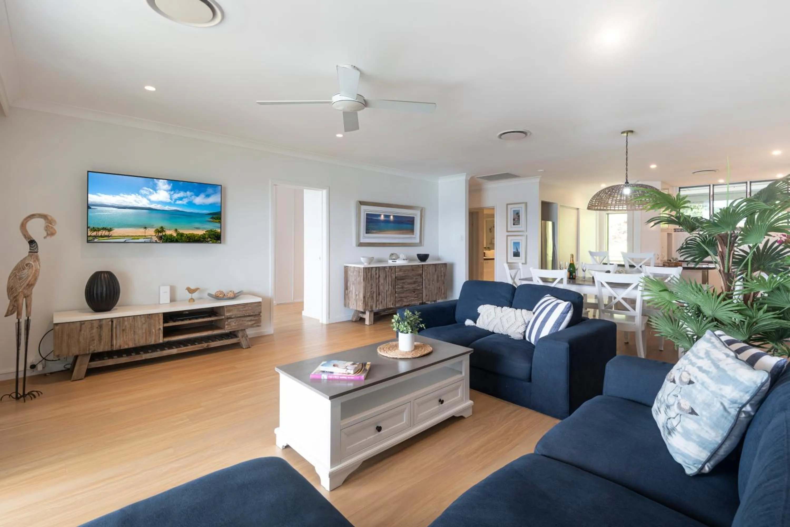 Living room in Lagoon Beachfront Lodge 202 on Hamilton Island by HamoRent