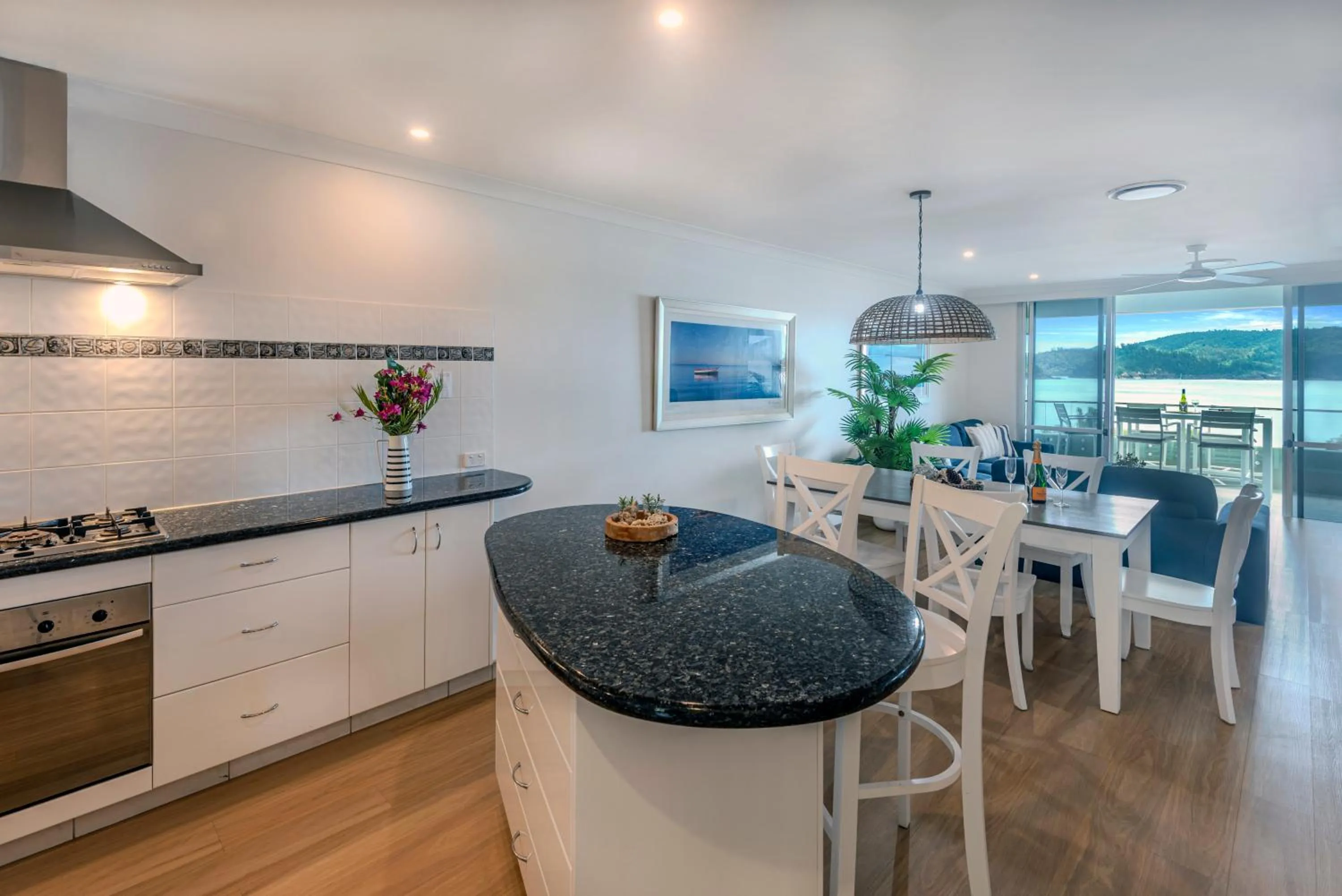 Kitchen or kitchenette in Lagoon Beachfront Lodge 202 on Hamilton Island by HamoRent