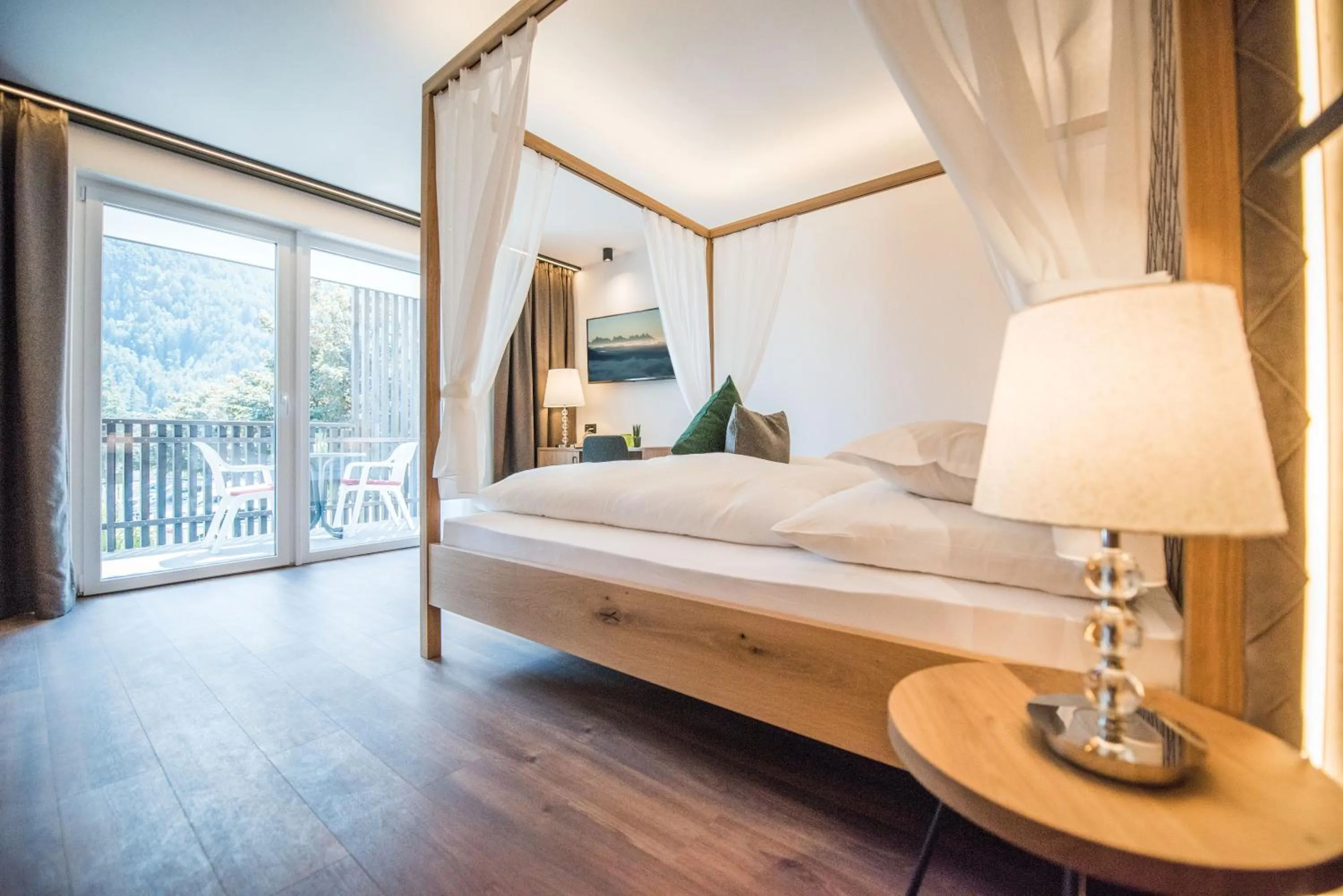 Bed in Vitaurina Royal Hotel