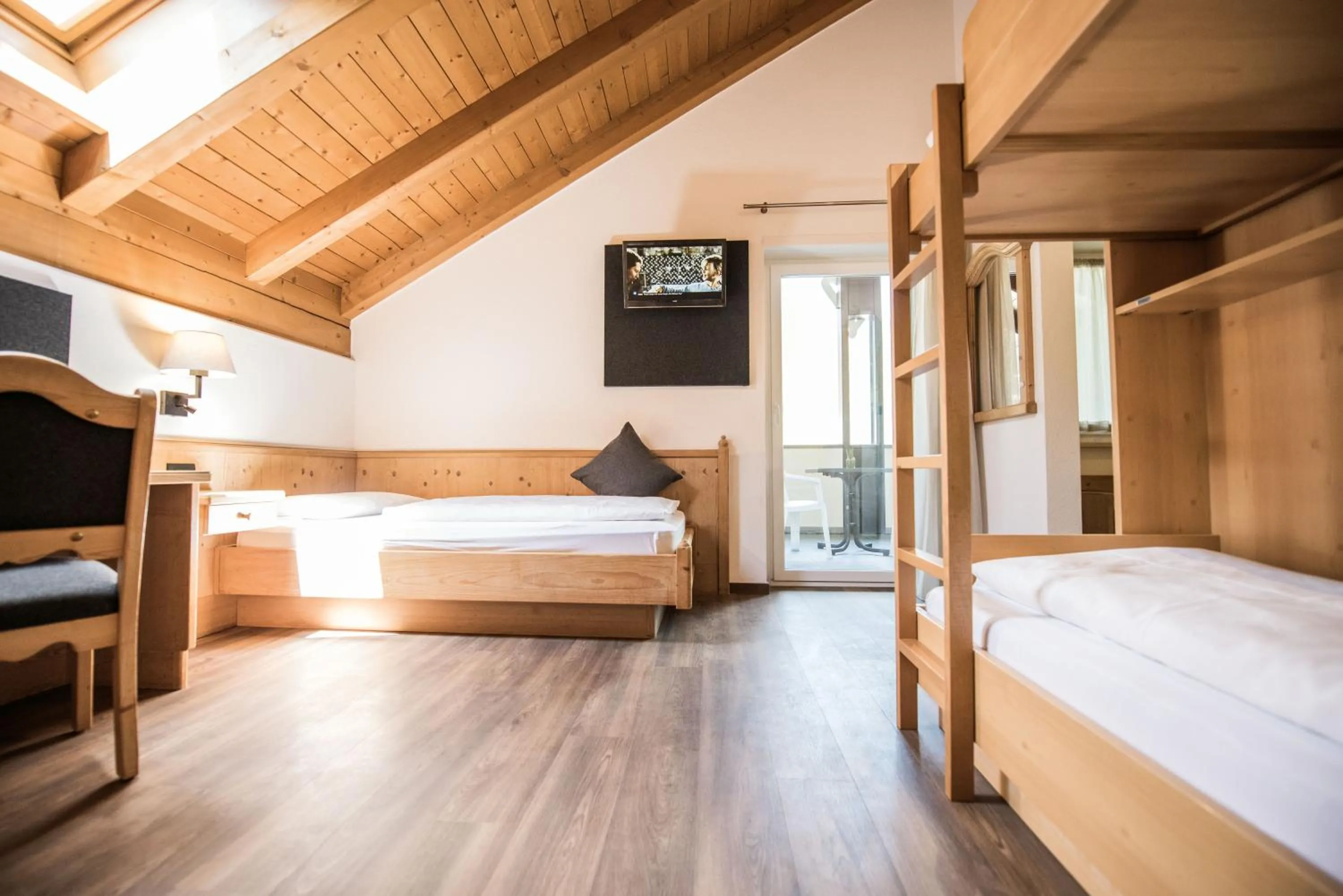 Bed in Vitaurina Royal Hotel