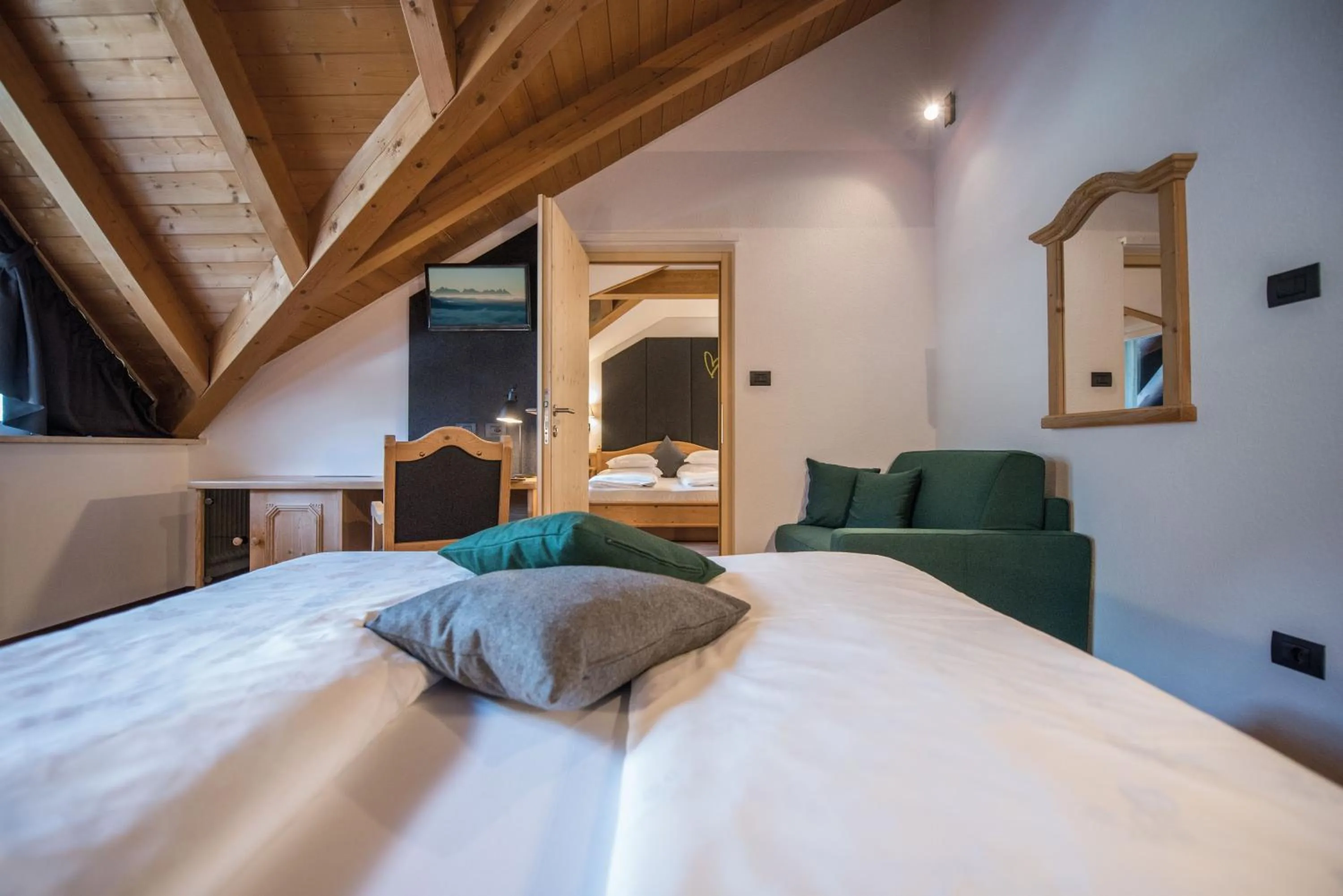 Bed in Vitaurina Royal Hotel