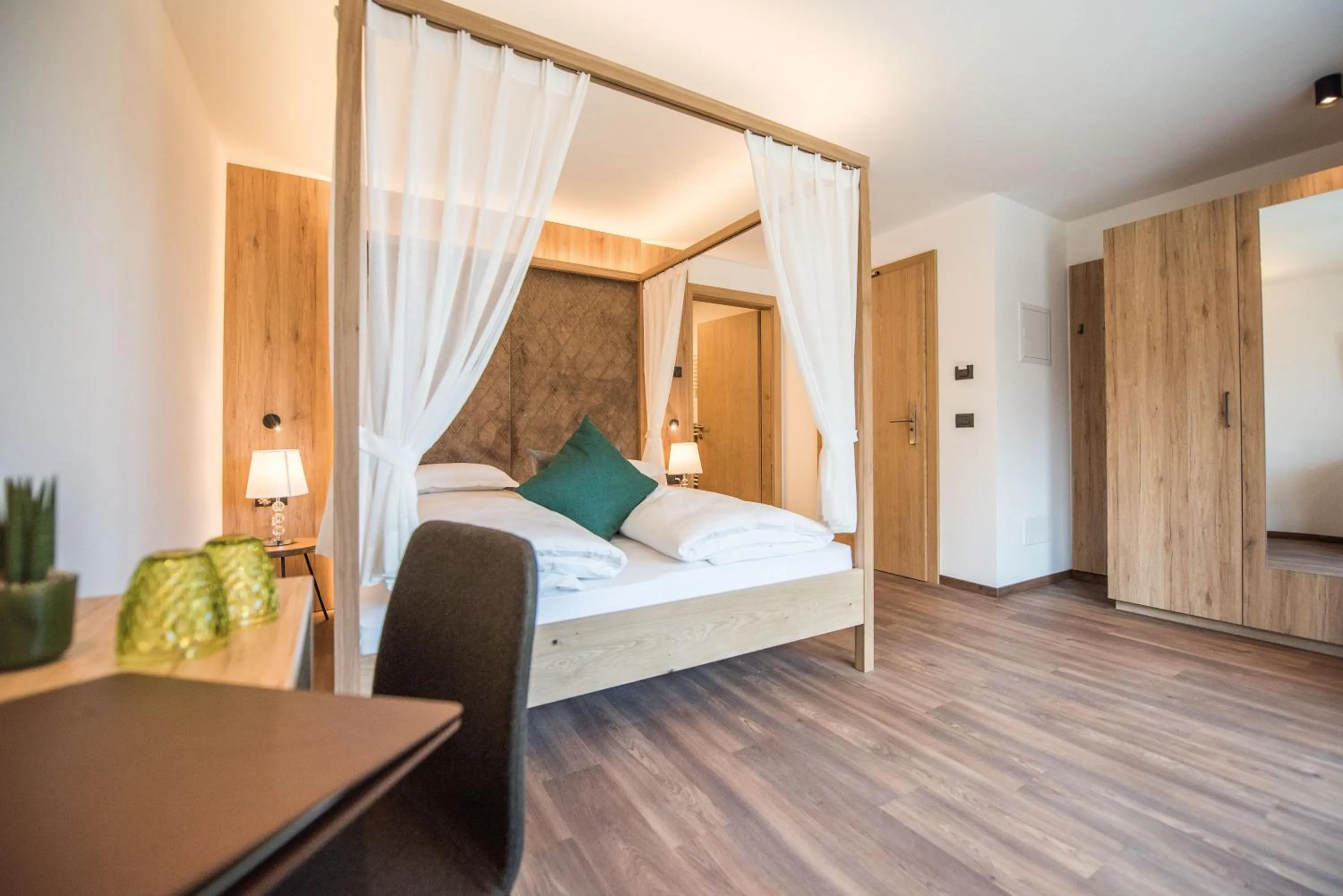 Bed in Vitaurina Royal Hotel