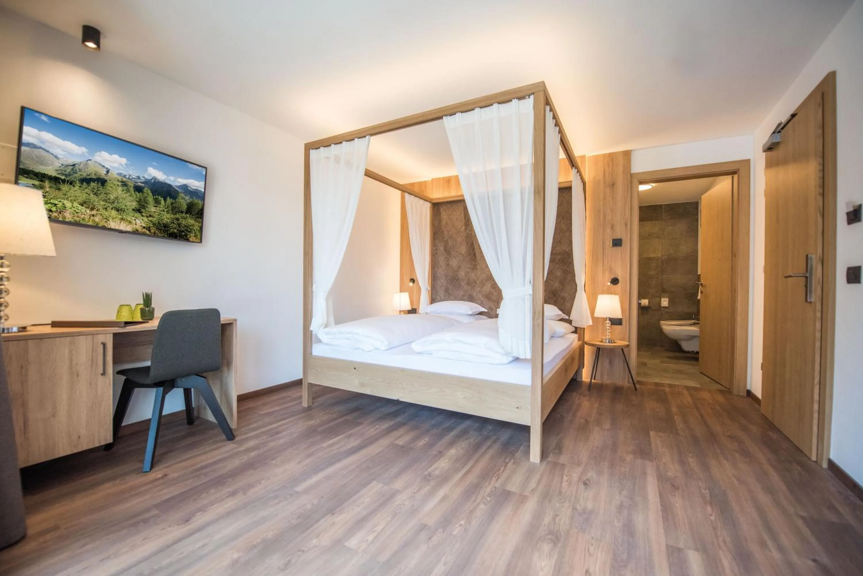 Bed in Vitaurina Royal Hotel