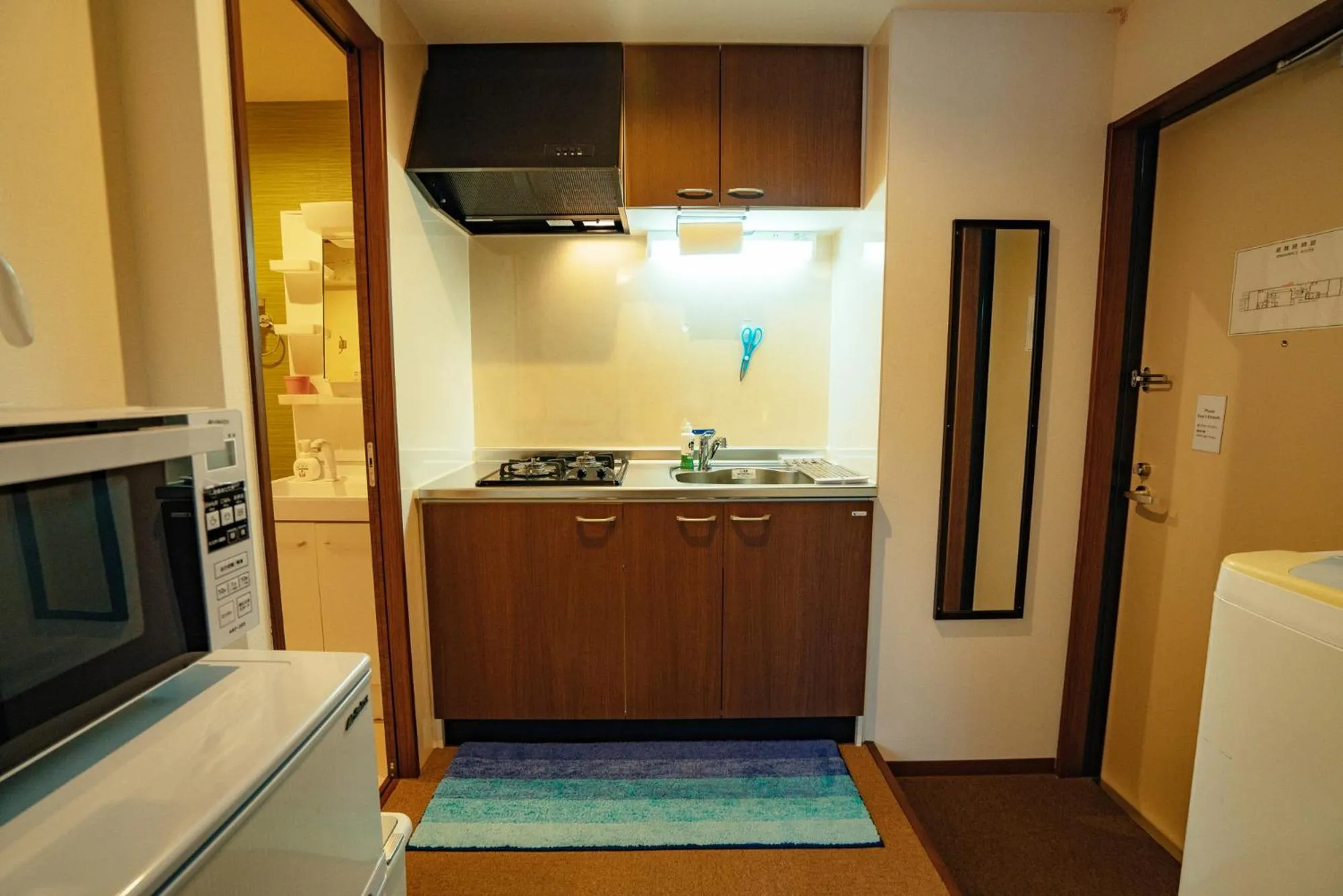 Kitchen or kitchenette in Ben's Guesthouse Kyoto